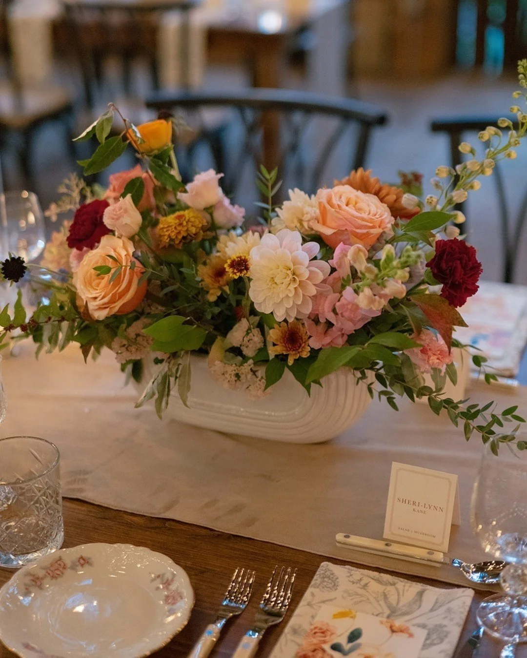 Small details can make a big impact. On this tablescape, patterned menus by @All_Thats_Lovely layered over patterned napkins added unexpected visual texture; effortless, subtle, and full of personality.

Paired with warm candlelight, Cashmere velvet 