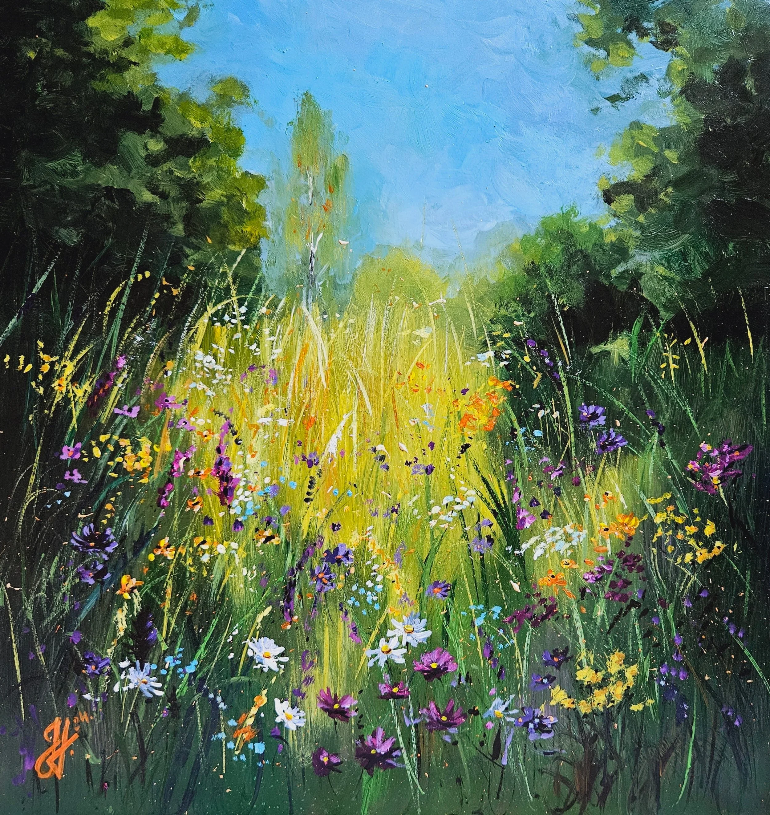 Letný deň v prírode na lúke uprostred kvetov.