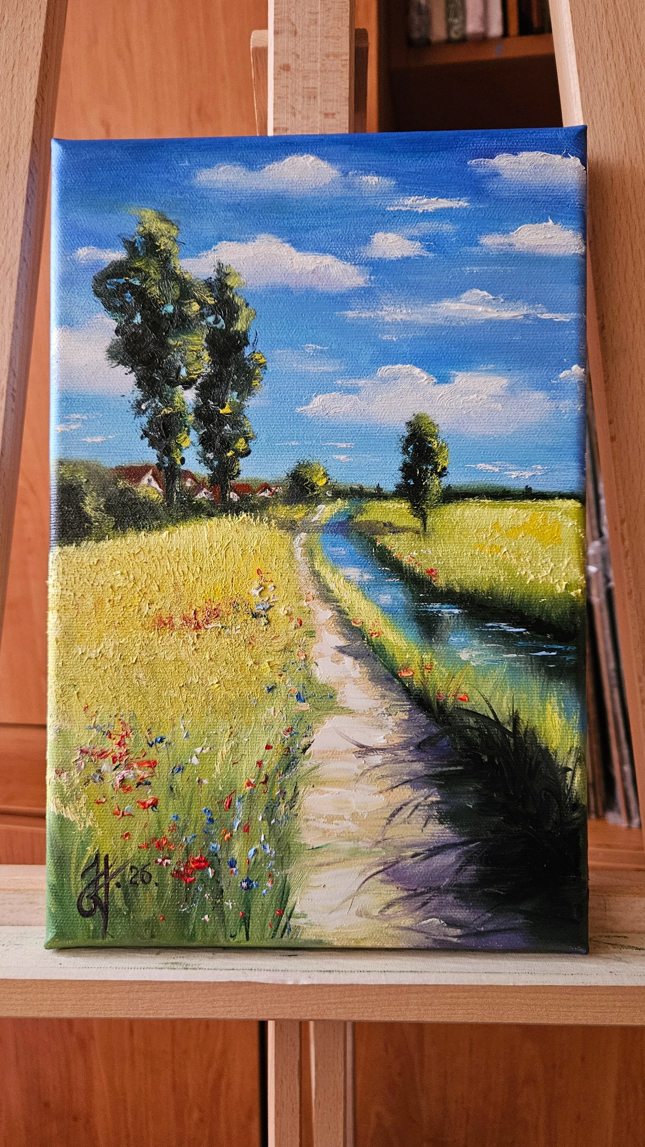 Letný deň na vidieku. Topole, polia, domčeky, voda. Ručne maľovaný obraz na predaj.