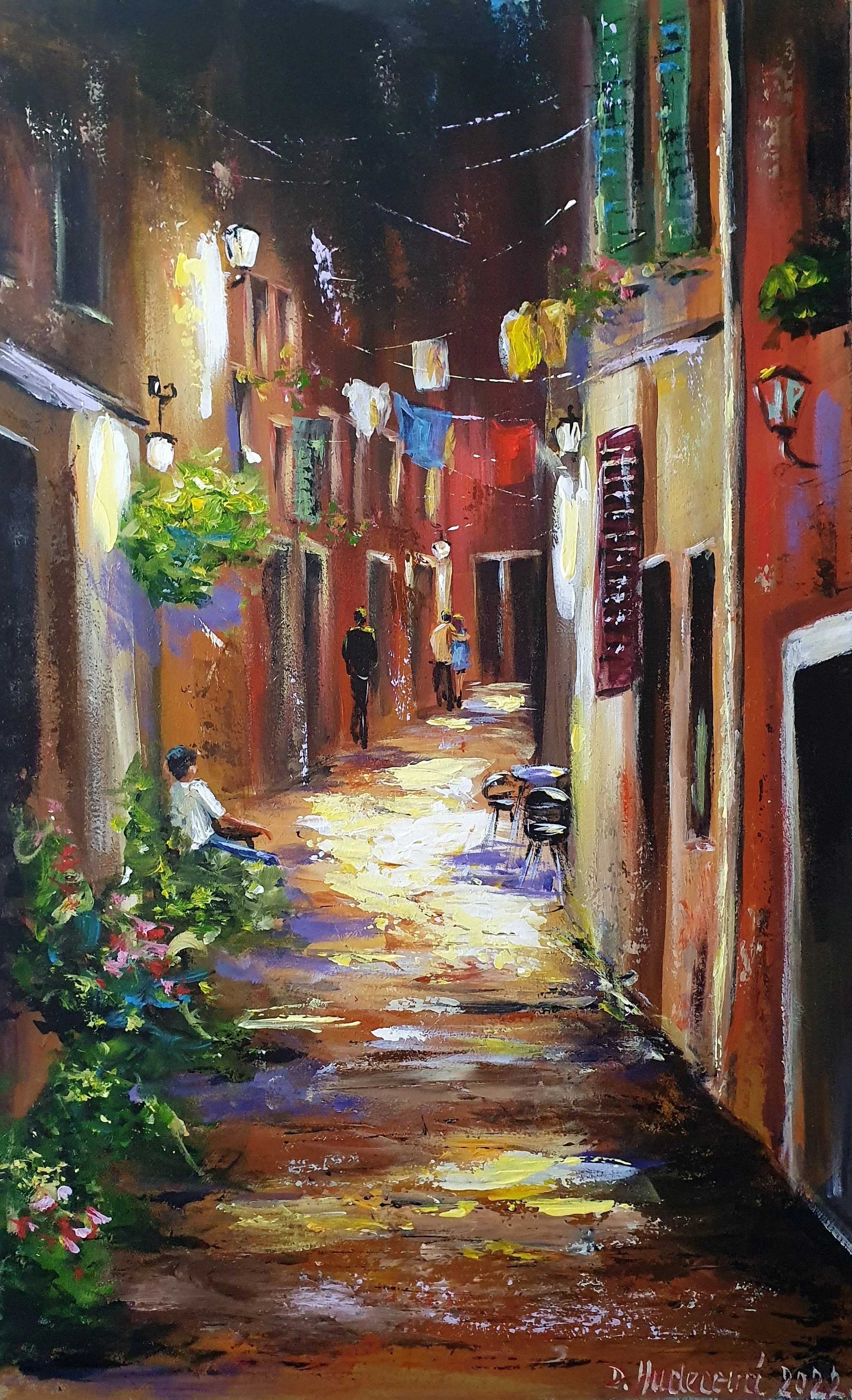 Obraz s južanskou letnou atmosférou. Prechádzka  ulicami mesta s večerným osvetlením.