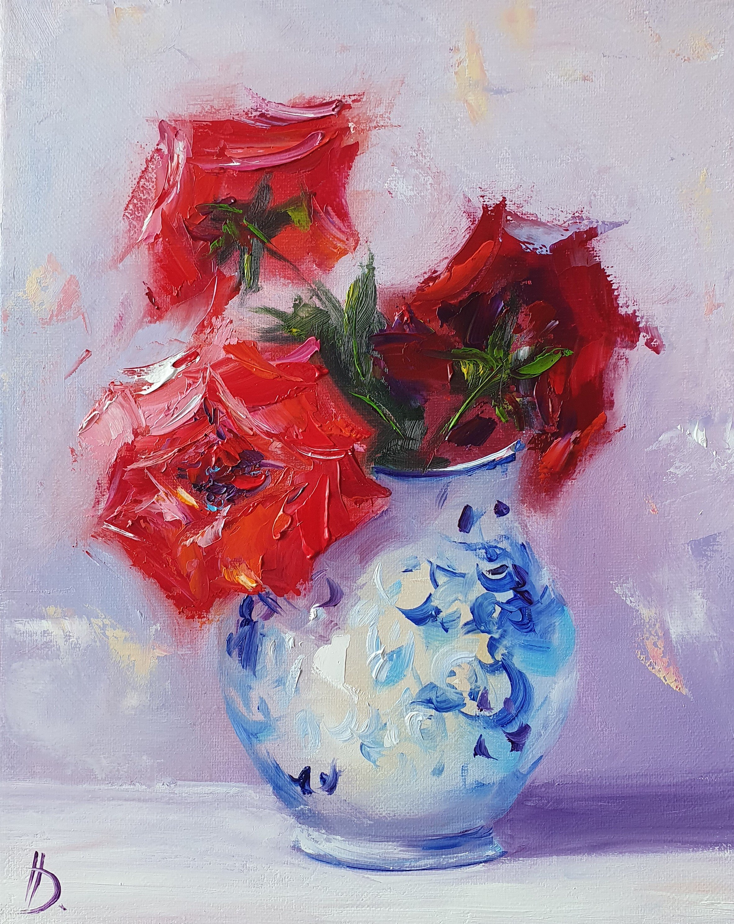 Červené ruže vo váze.