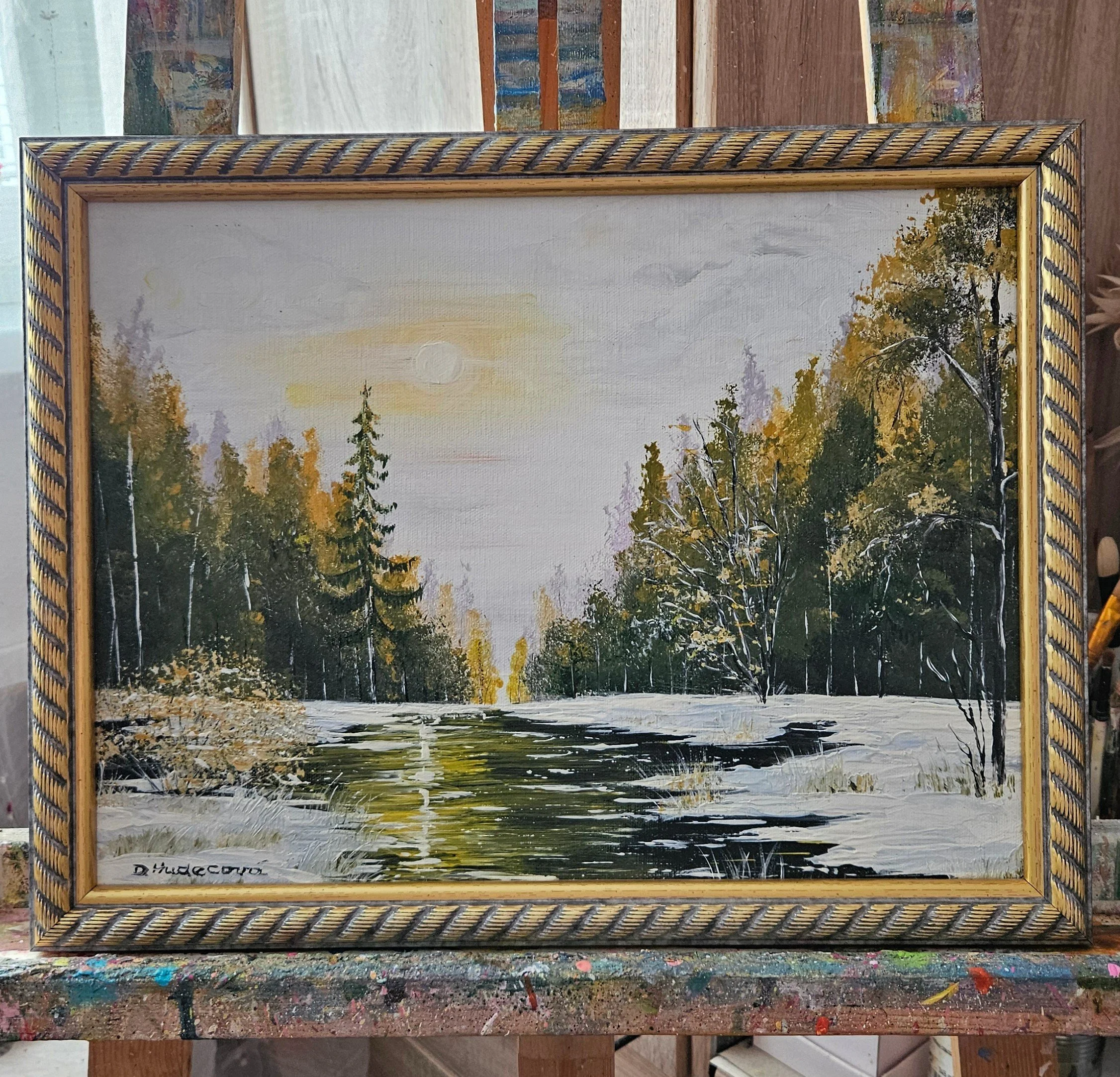 Zima v prírode. Sneh, jazero, stromy. Ručne maľovaný obraz na predaj. Zarámovaný.