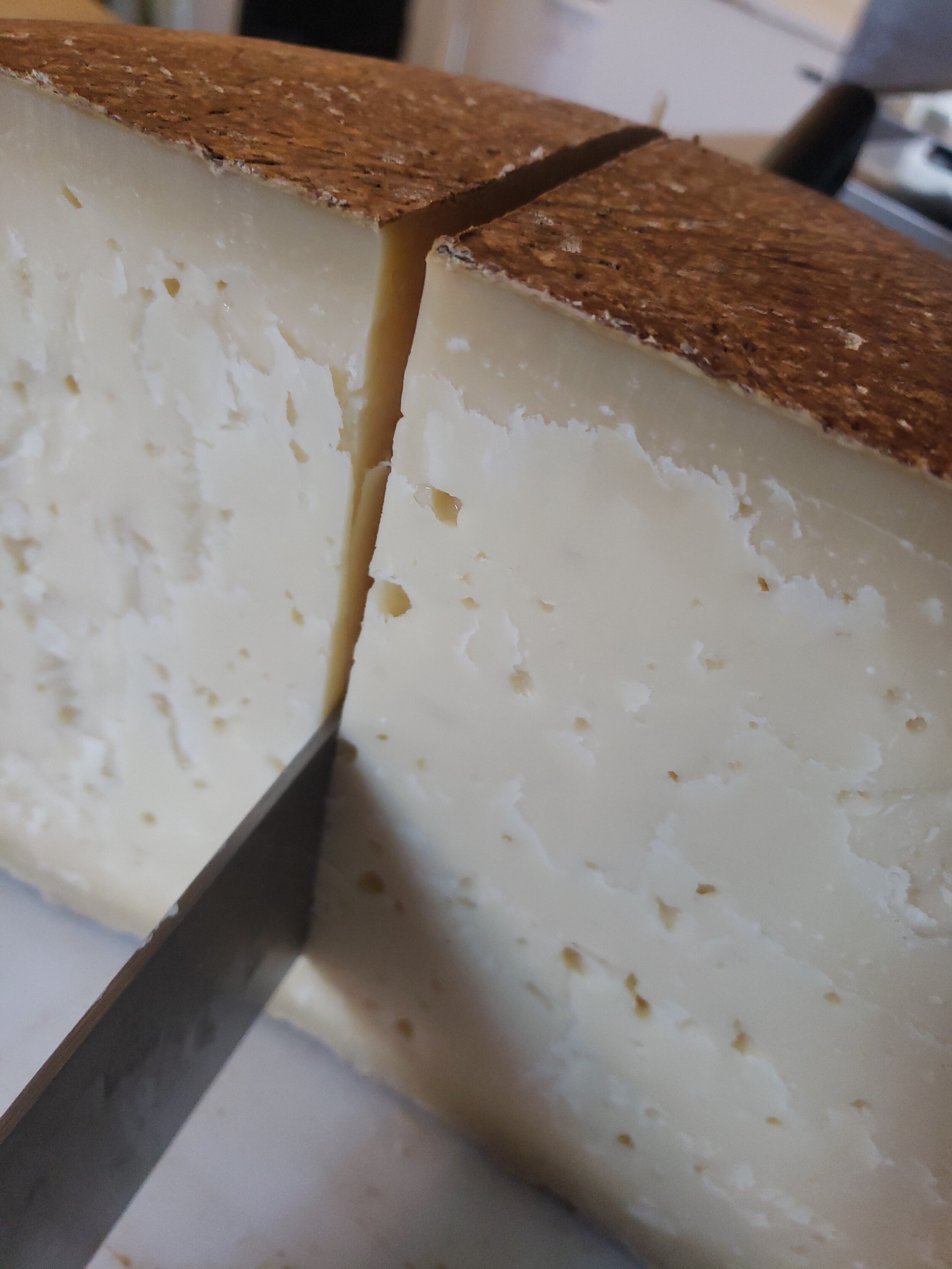 Aged for over two years, SBRINZ develops such complex tastes, from fruity sharp to caramelized earthy notes, that we consider it to be the crown of Abbot Hill Creamery. The recipe originates in Switzerland and is a hybrid between long-aged Gouda and