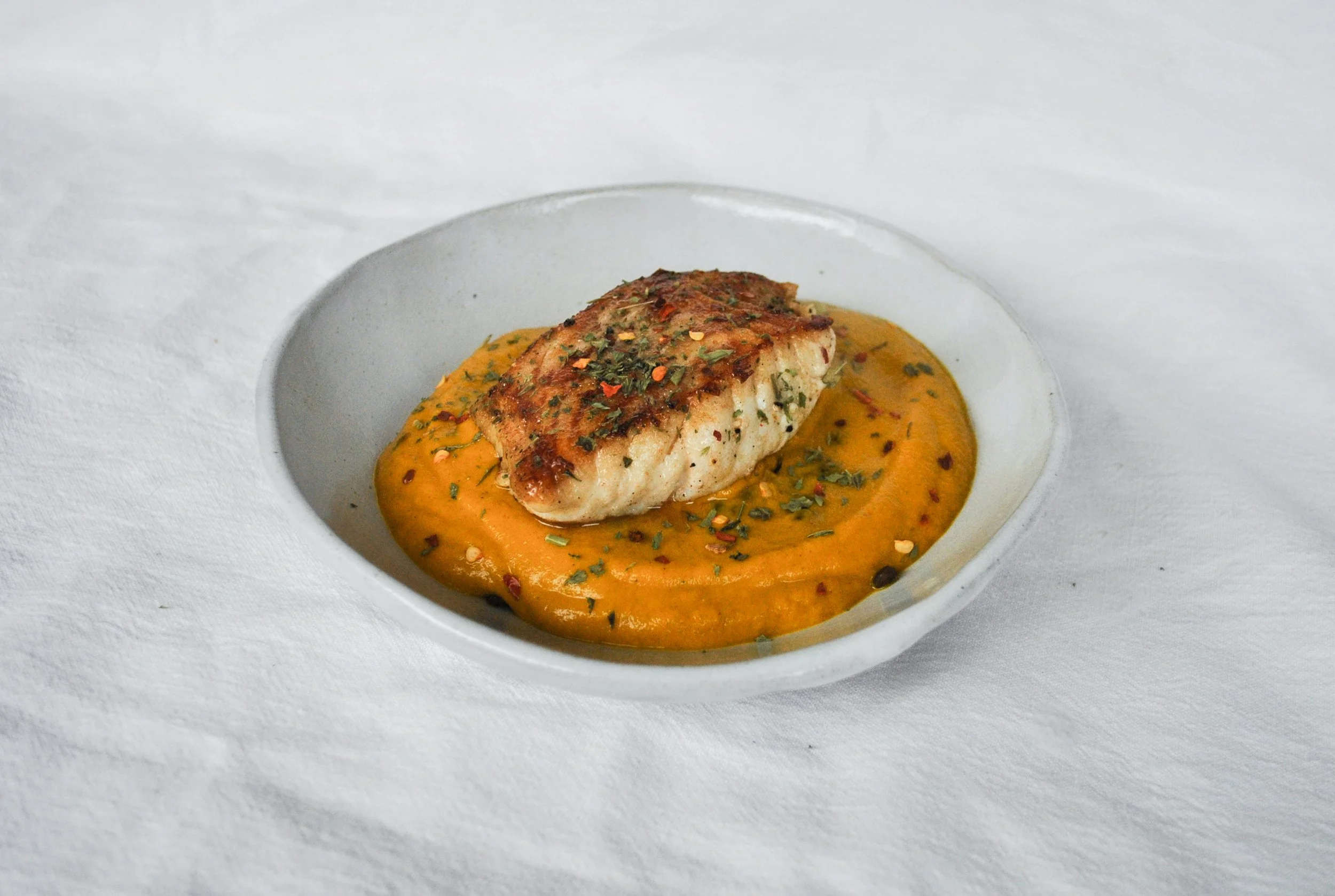 Cod & Beluga Lentils on Curried Carrot Puree