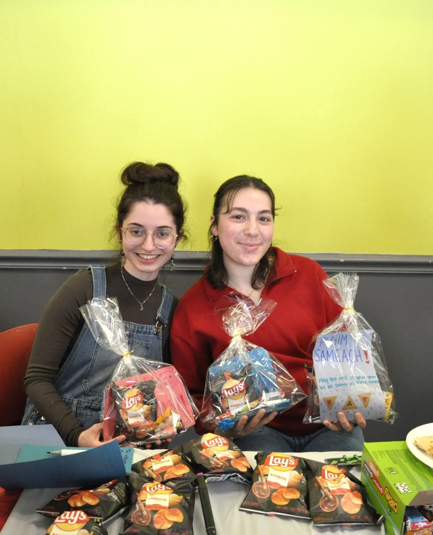 It's the Jewish month of Adar 🎭✨. Which means it's the happiest month of the Jewish calendar and the perfect time to spread light and love !!!⁠
⁠
Our students truly embodied that spirit of Adar by packing Mishloach Manot  for local seniors at Young 