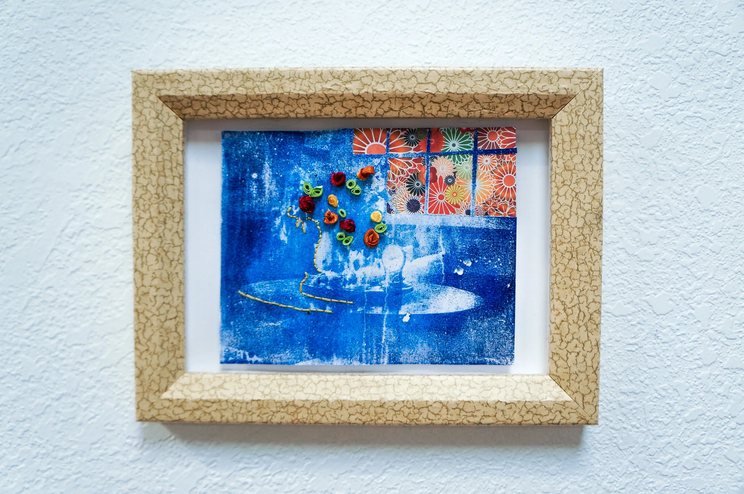 The fireworks outside are irrelevant to me
Approx. 6” x 4” 
Embroidery and collage on gelplate transferred image
$85

