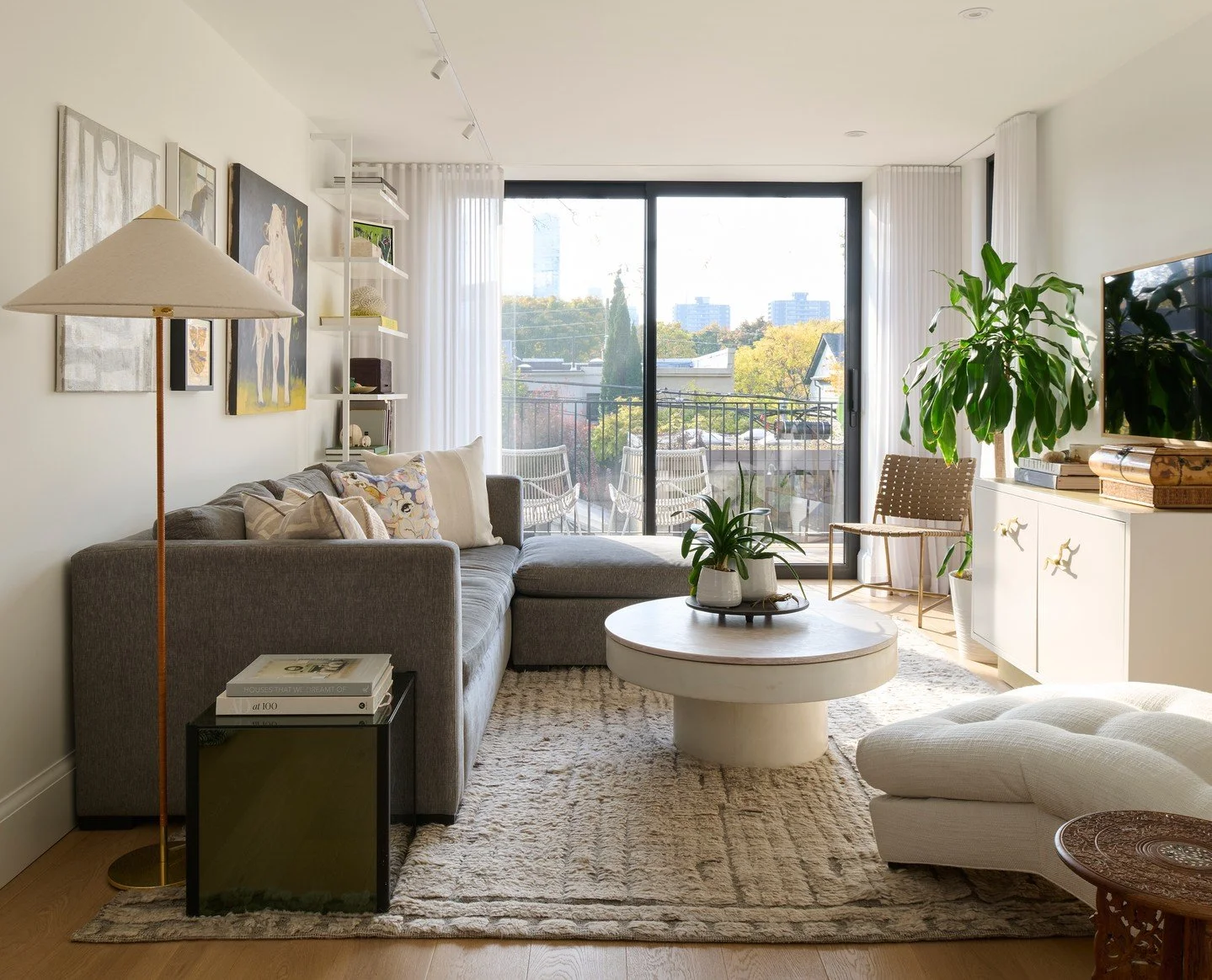 This is my own family room, and it&rsquo;s not big at all &mdash; just 11&rsquo; x 16.5&rsquo;. But it feels open and calm because of a few key choices: tall windows, drapery, and furniture that fits the space instead of fighting it.

For me, that&rs