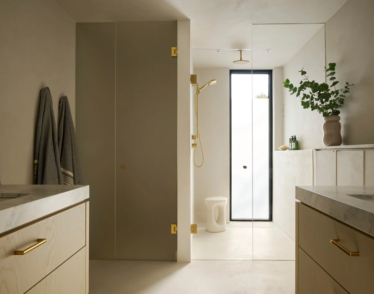 Do you ever notice how much better your whole day feels when your bathroom is calm and organized? That&rsquo;s what we wanted here. 

A soothing palette sets the tone, the tall shower window fills the space with natural light, and there&rsquo;s plent