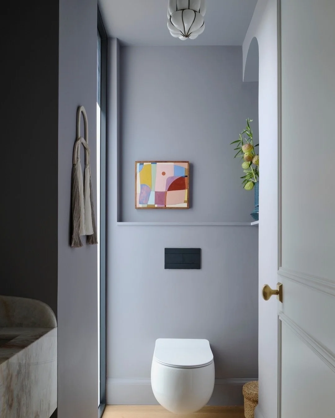 The best small powder rooms are the ones that don&rsquo;t feel small, and that&rsquo;s exactly what we aimed for here. 
⠀⠀⠀⠀⠀⠀⠀⠀⠀
We carved this space out of an unused nook off the kitchen and made every inch work hard. By floating the toilet, keepin