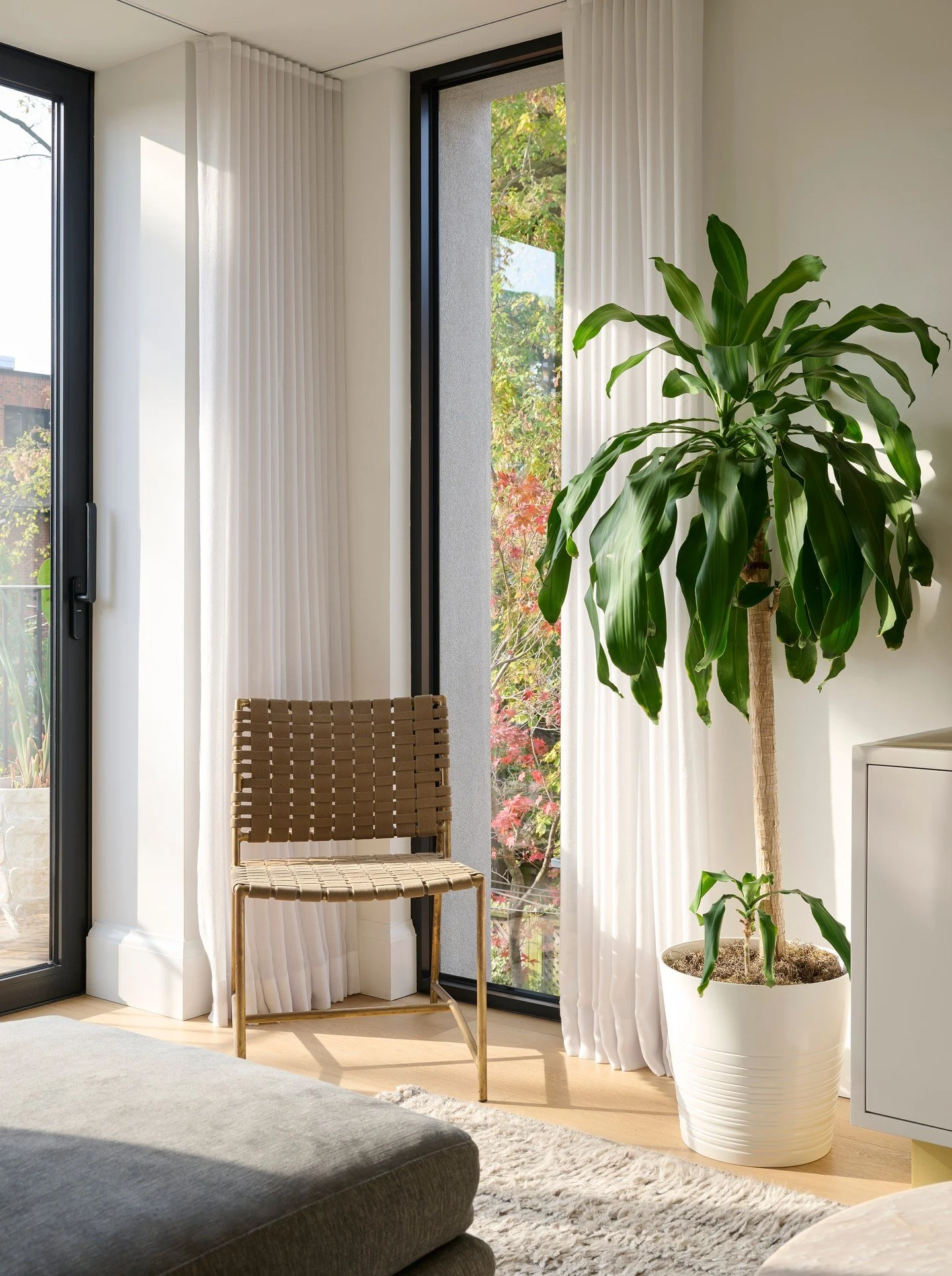 One thing I almost always do is take the drapery all the way to the ceiling, even when the window doesn&rsquo;t go that high. It draws your eye up, makes the room feel taller, and softens the space in a really nice way. 

It&rsquo;s a small detail, b