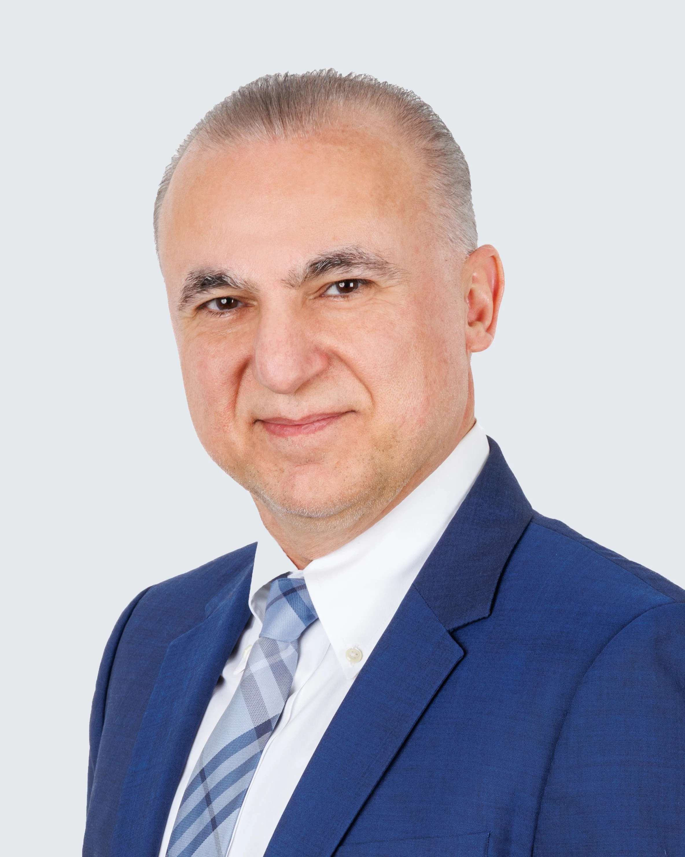 A headshot photo of Dr. Teher