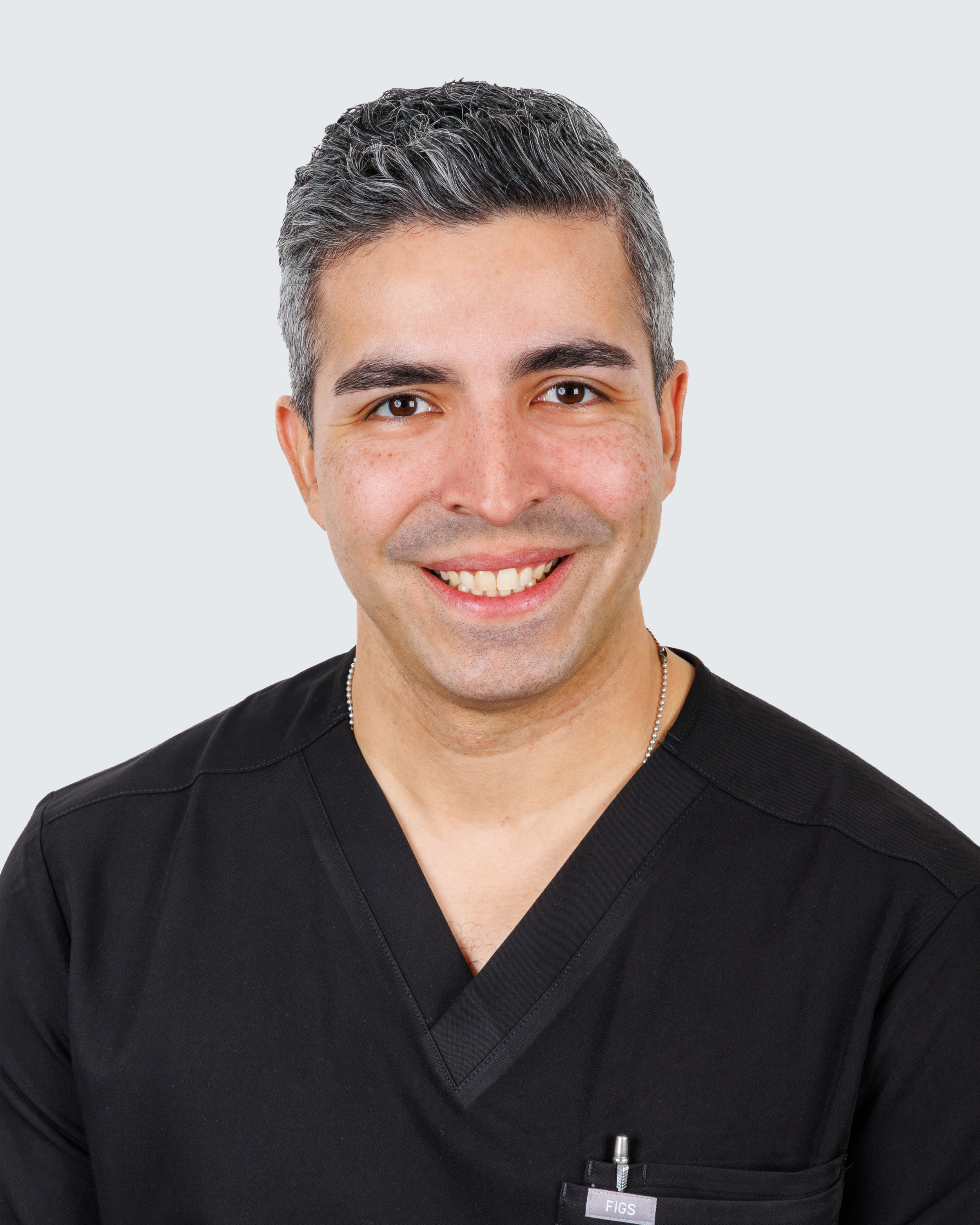 A headshot photo of Dr. Julio Vega