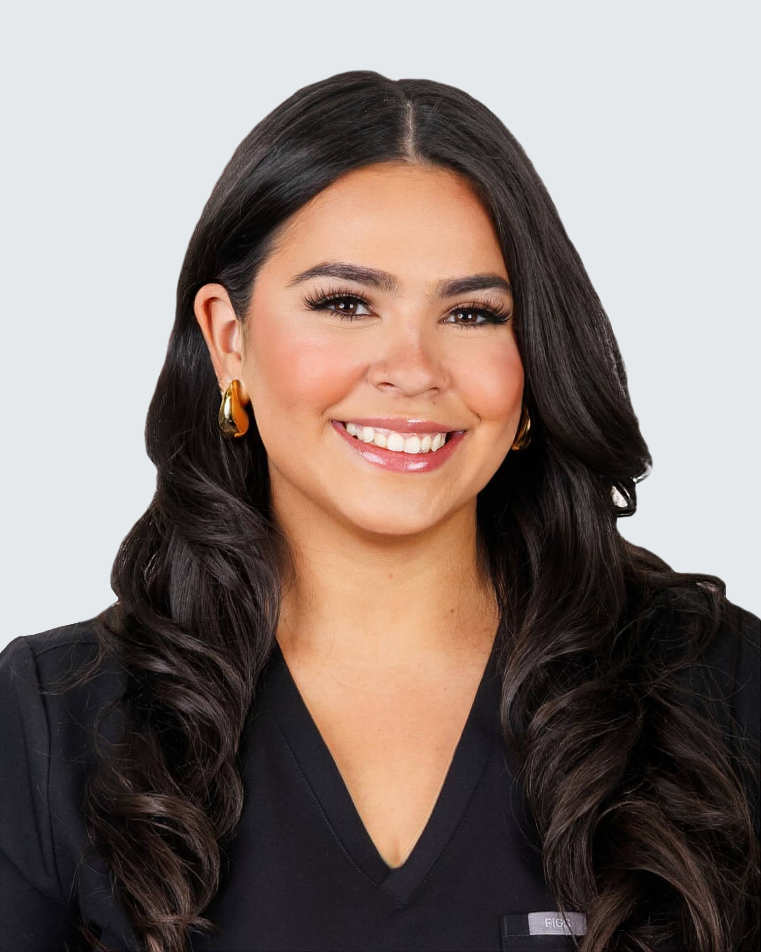 A headshot photo of Angie C., BonLeven Front Desk Coordinator.