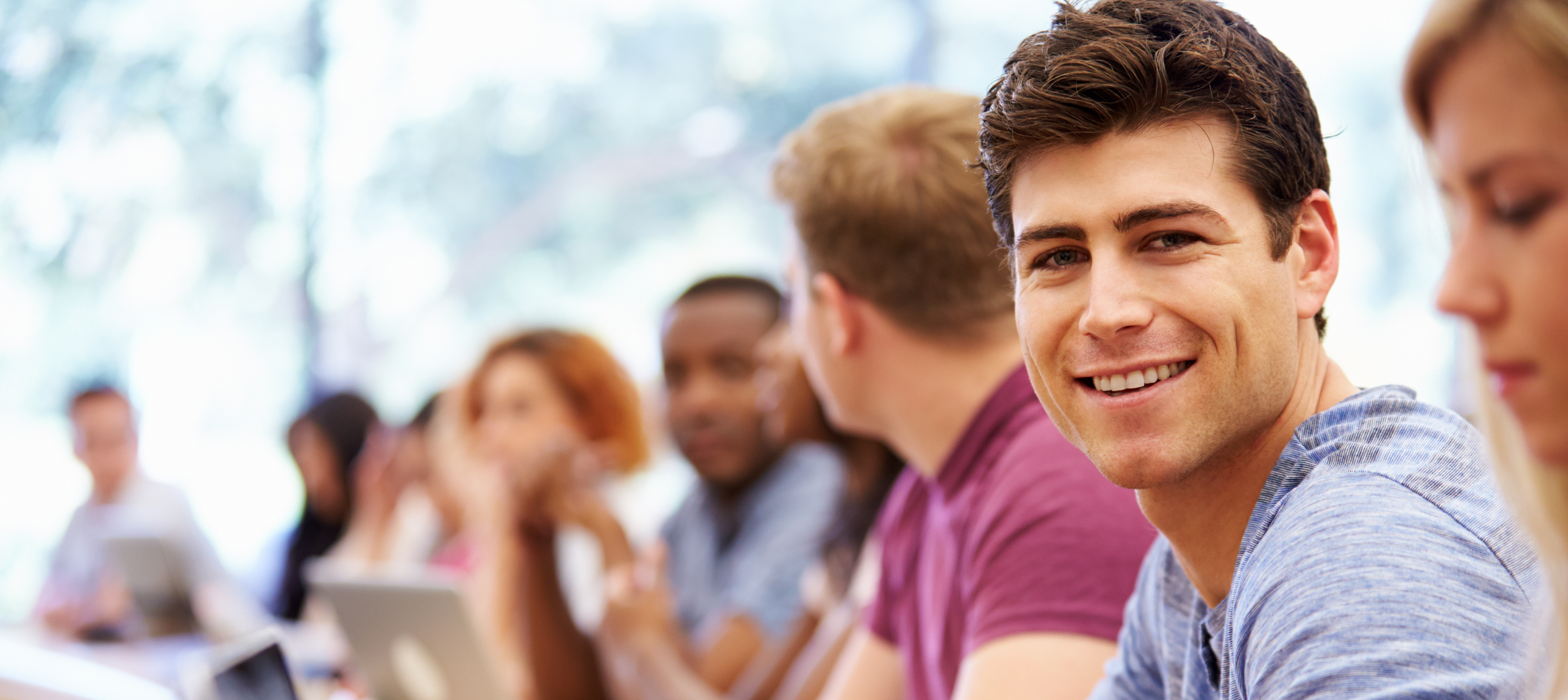 college students in lecture hall.png