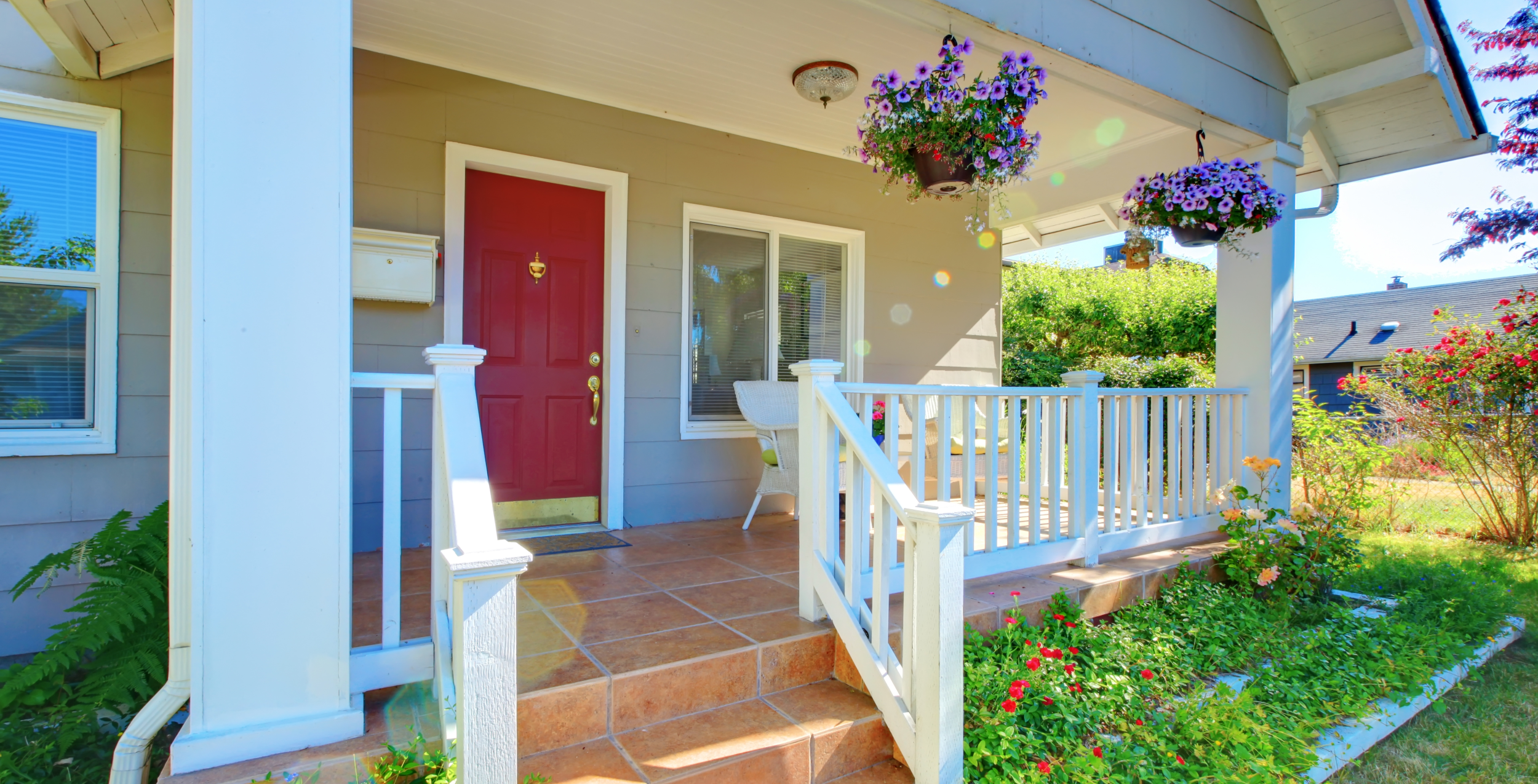 Front porch in Spring with Red Door 2500x1667.png