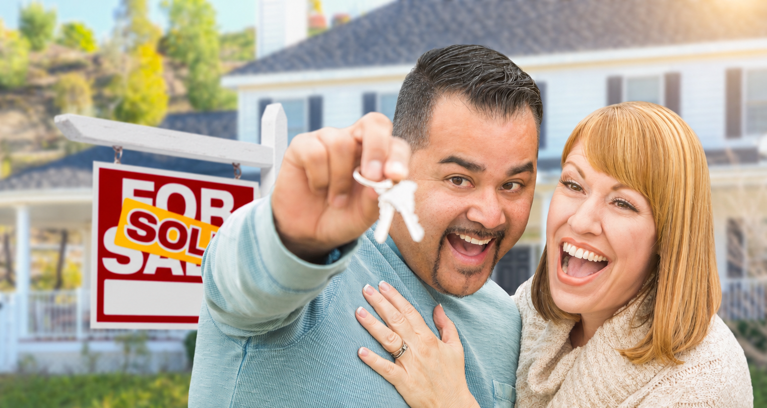 New homeowners celebrating home purchase.png