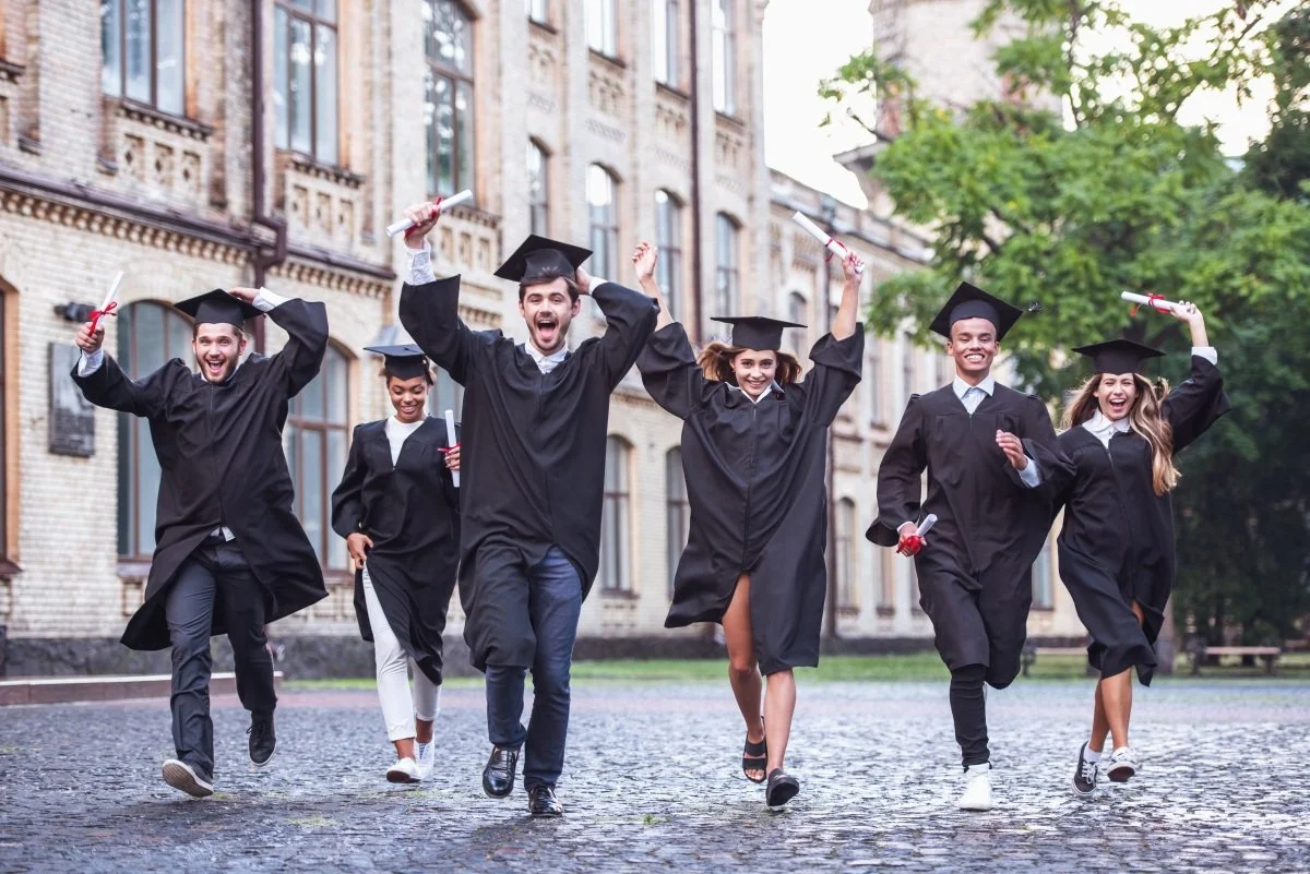 College Grads Running in Cap and Gown 1200x801.jpg