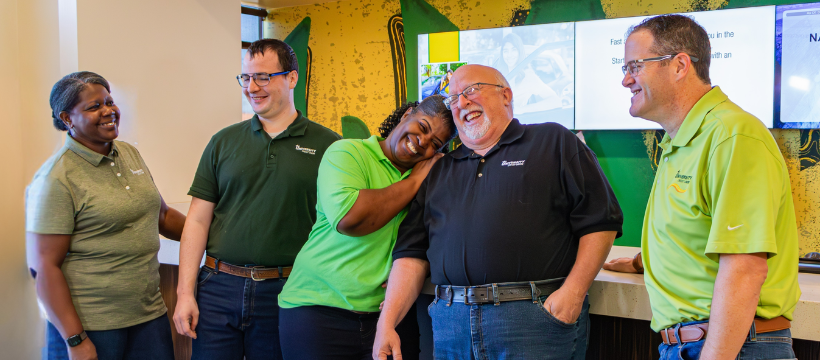 A picture of the Waco branch personnel laughing.