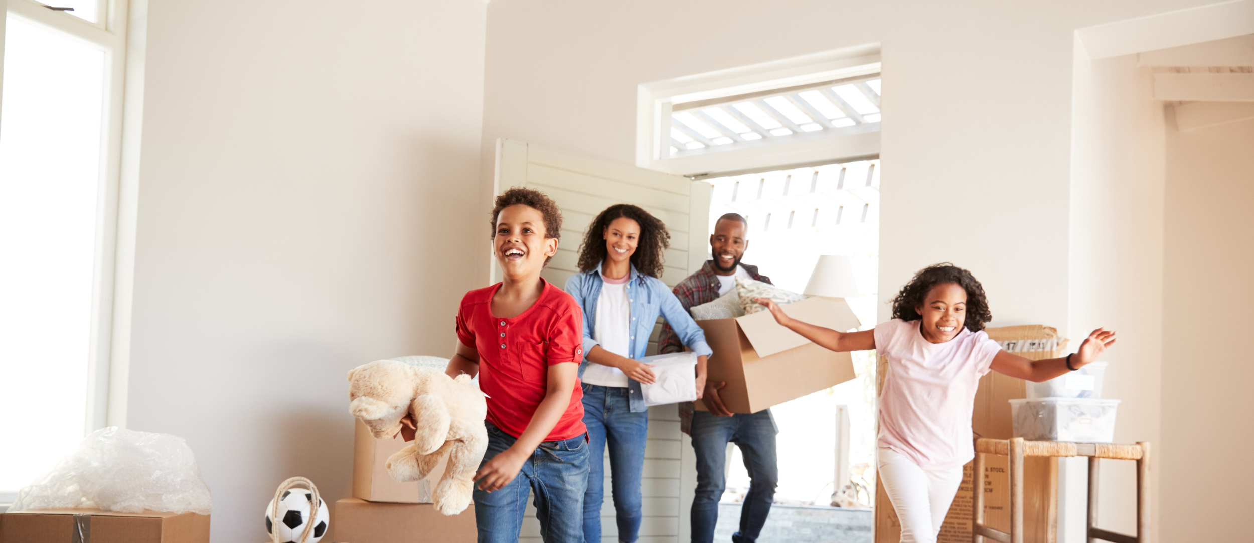 Happy Family on moving day cropped 2 2500x1084.png