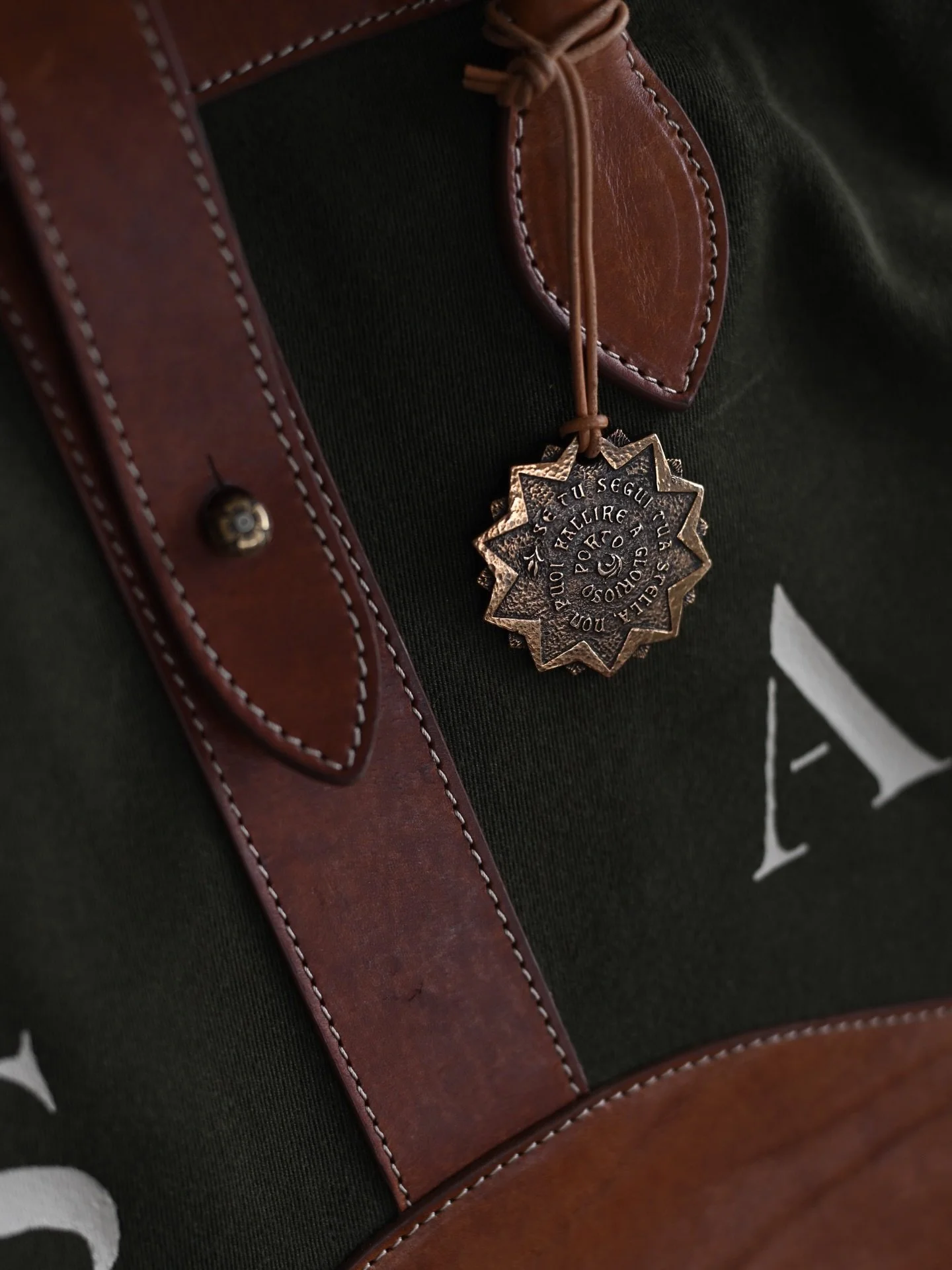 Verde &amp; Bronzo 
//
Green &amp; bronze: some colors - no matter the material - are just meant to go together. 
//
Pictured here, Paolo Penko&rsquo;s &ldquo;Dante&rdquo; Charm (forthcoming) on our &laquo;Monogramma&raquo; Tote, and his Bronze &laqu