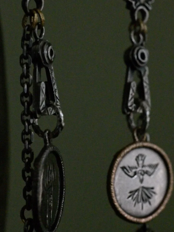 The &laquo;Moneta&raquo; Pendant
//
Some might see these as amulets, others as mementos&hellip; I personally view them as anchors. Not the kind that holds you back; instead, these anchors keep you grounded. 
//
Personally, all it takes is a quick gla