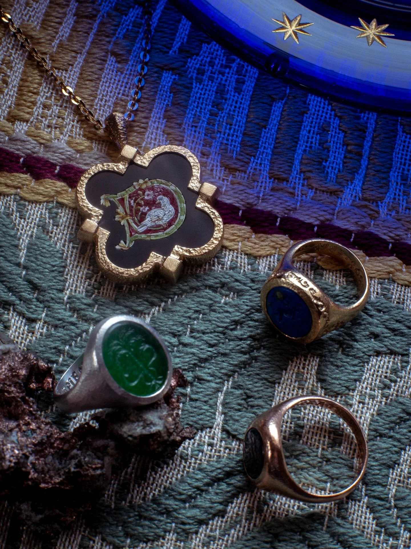 To hold the cosmos in the palm of your hand. 

A square in representation of earth, water, air and fire: the terrestrial realm. Four bisected circles, the infinite sides of which represent the celestial realm. 

Beyond our comprehension and too great