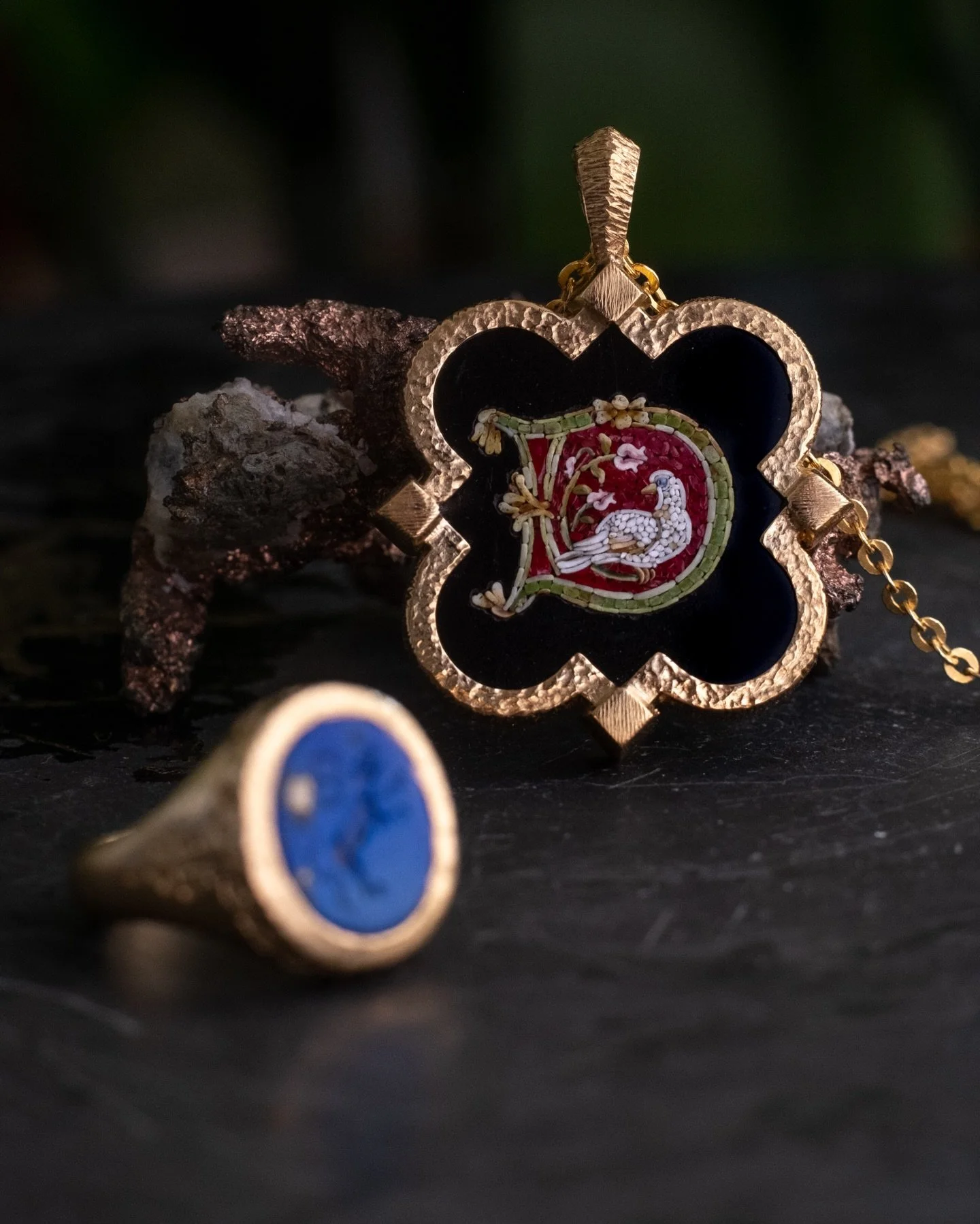 Stone, glass &amp; gold
//
An allegorical representation of the cosmos, and at its center the first initial of the person at the center of our family. 
//
It would be worth painting a portrait to pay homage to some people, but at times it&rsquo;s bet