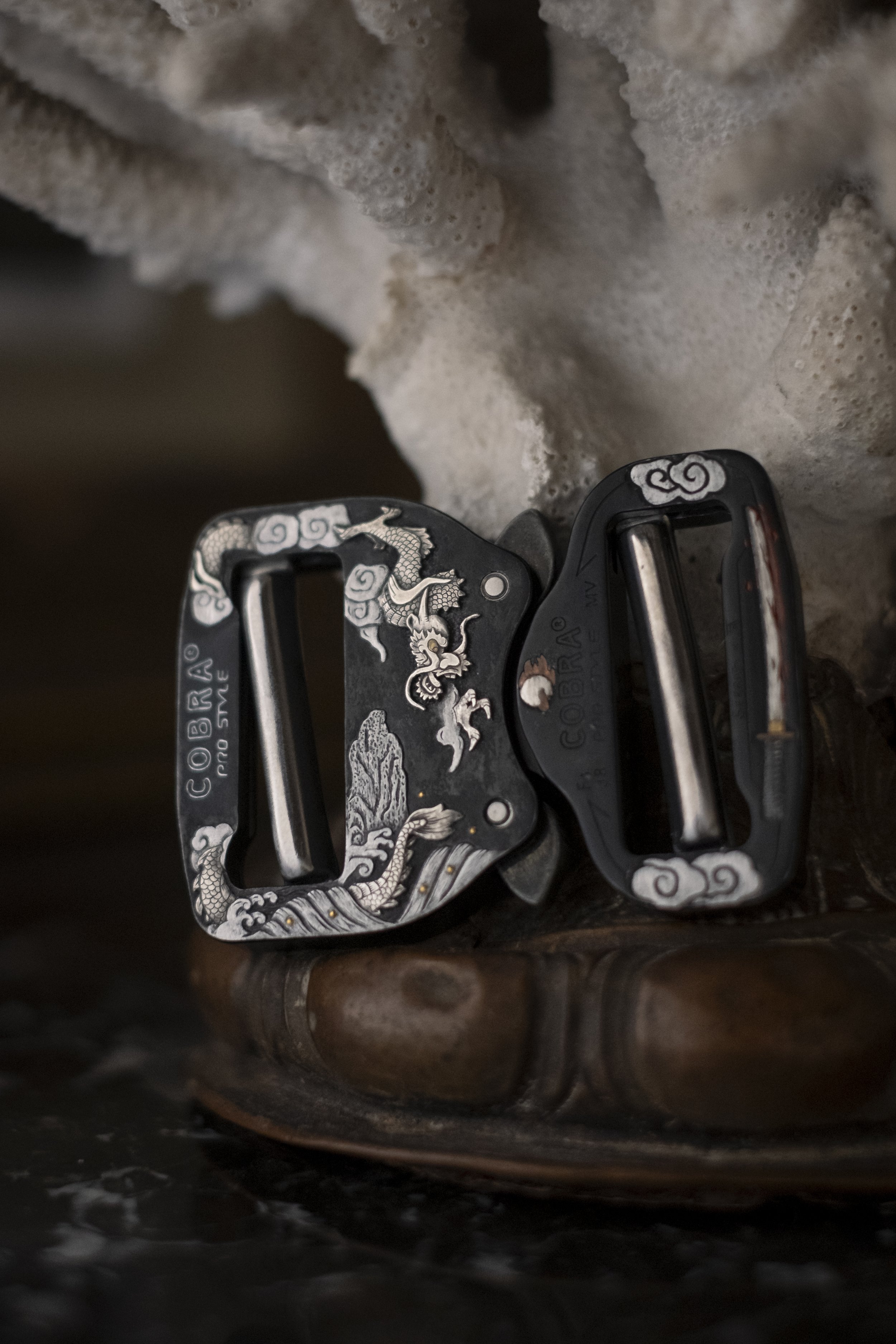 A hand engraved and inlaid belt buckle made in collaboration with The Observer Collection. This piece was inspired by "tsuba," the handguard of Samurai swords, and exhibits the use of mixed techniques including surface engraving, sculpting, punto bul