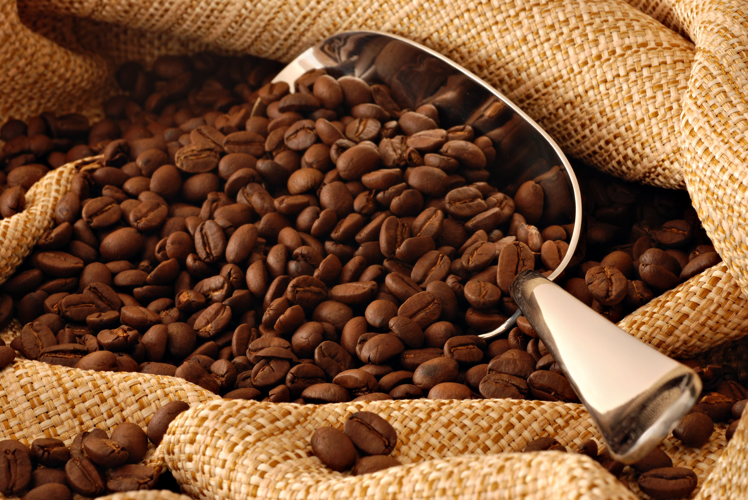 bigstock-coffee-beans-spilling-out-of-s-15023666.jpg