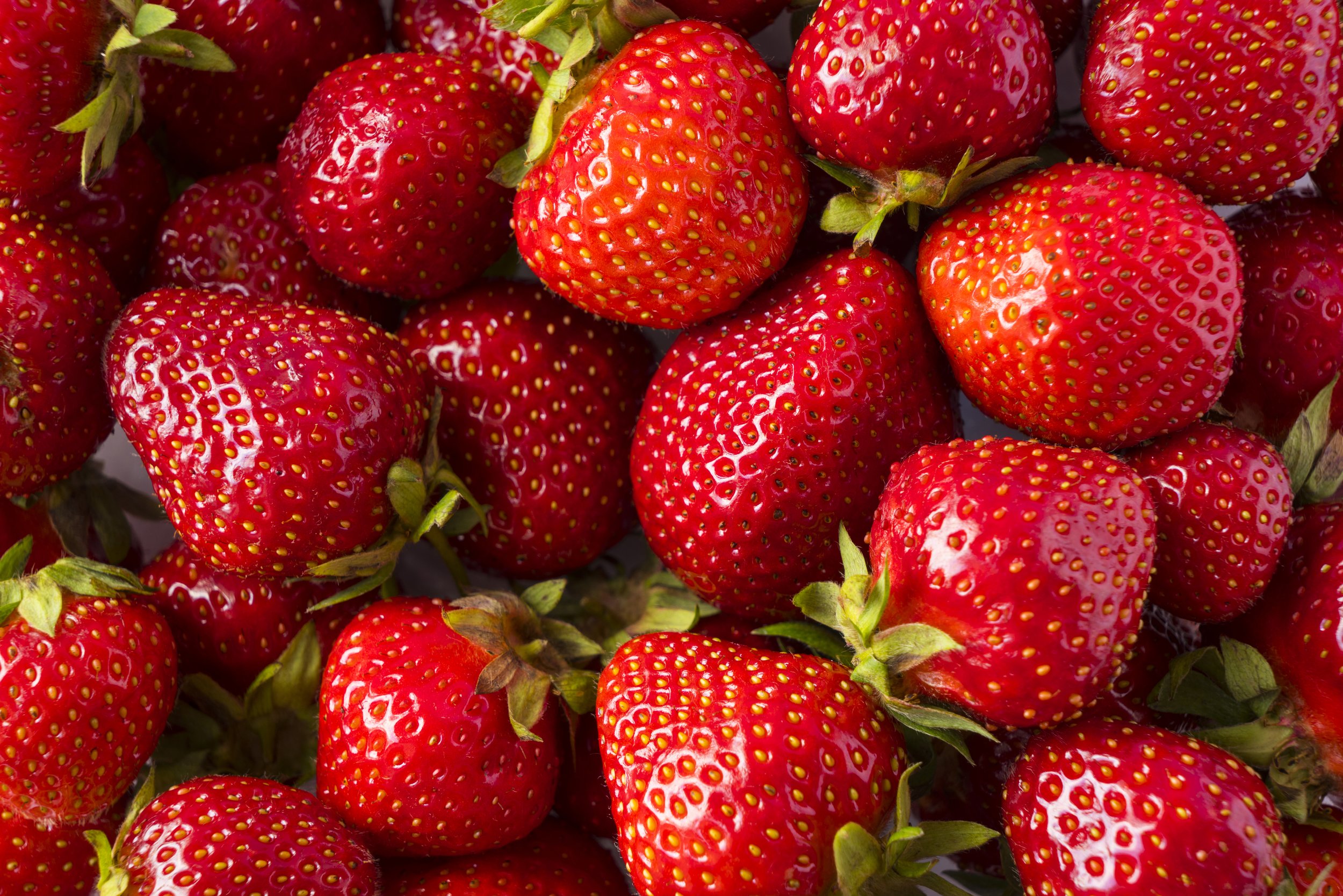 bigstock-Background-Of-Fresh-Strawberri-337029010 (1).jpg