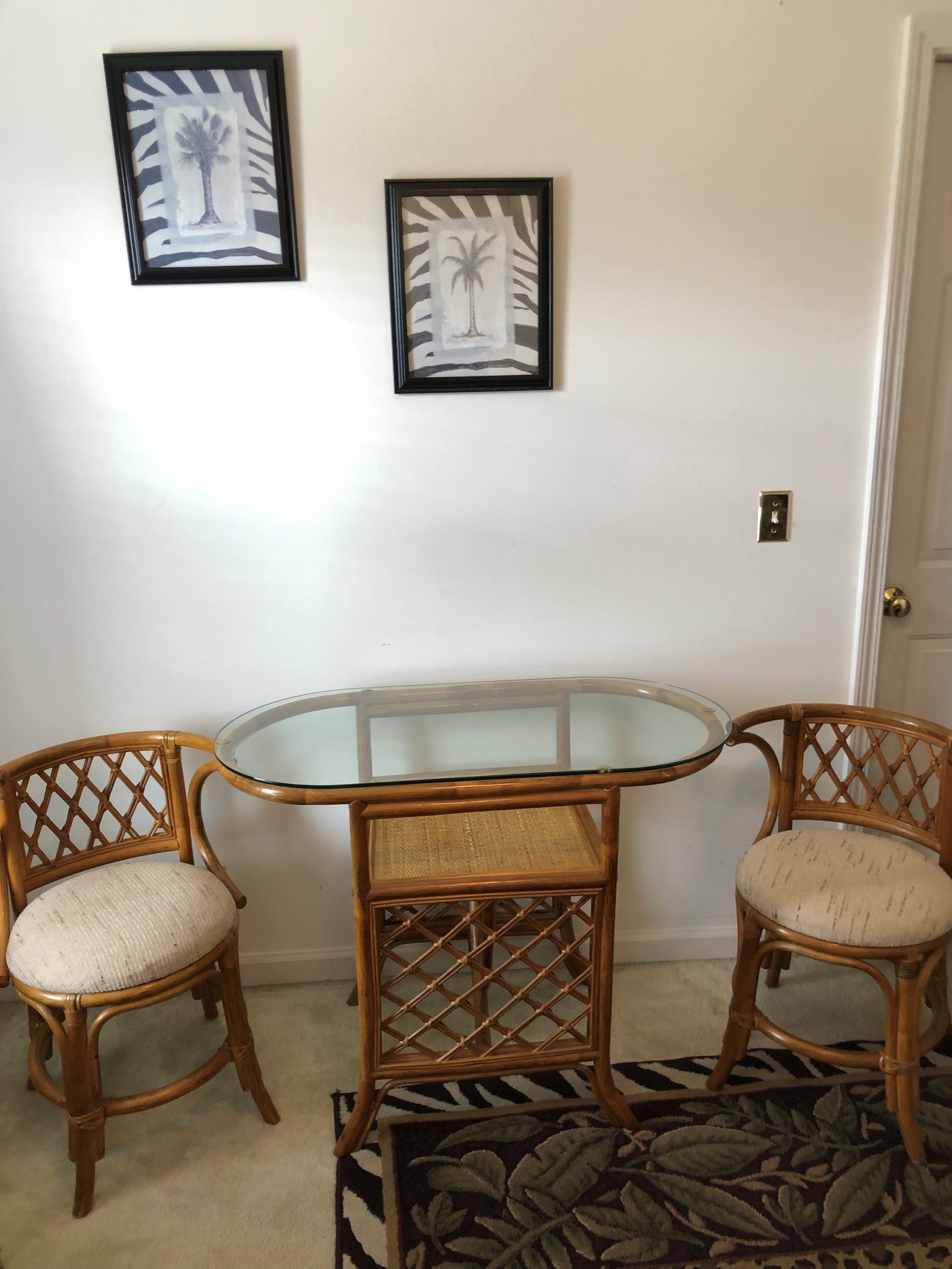 Rattan Chairs and Glass Top Table.jpg