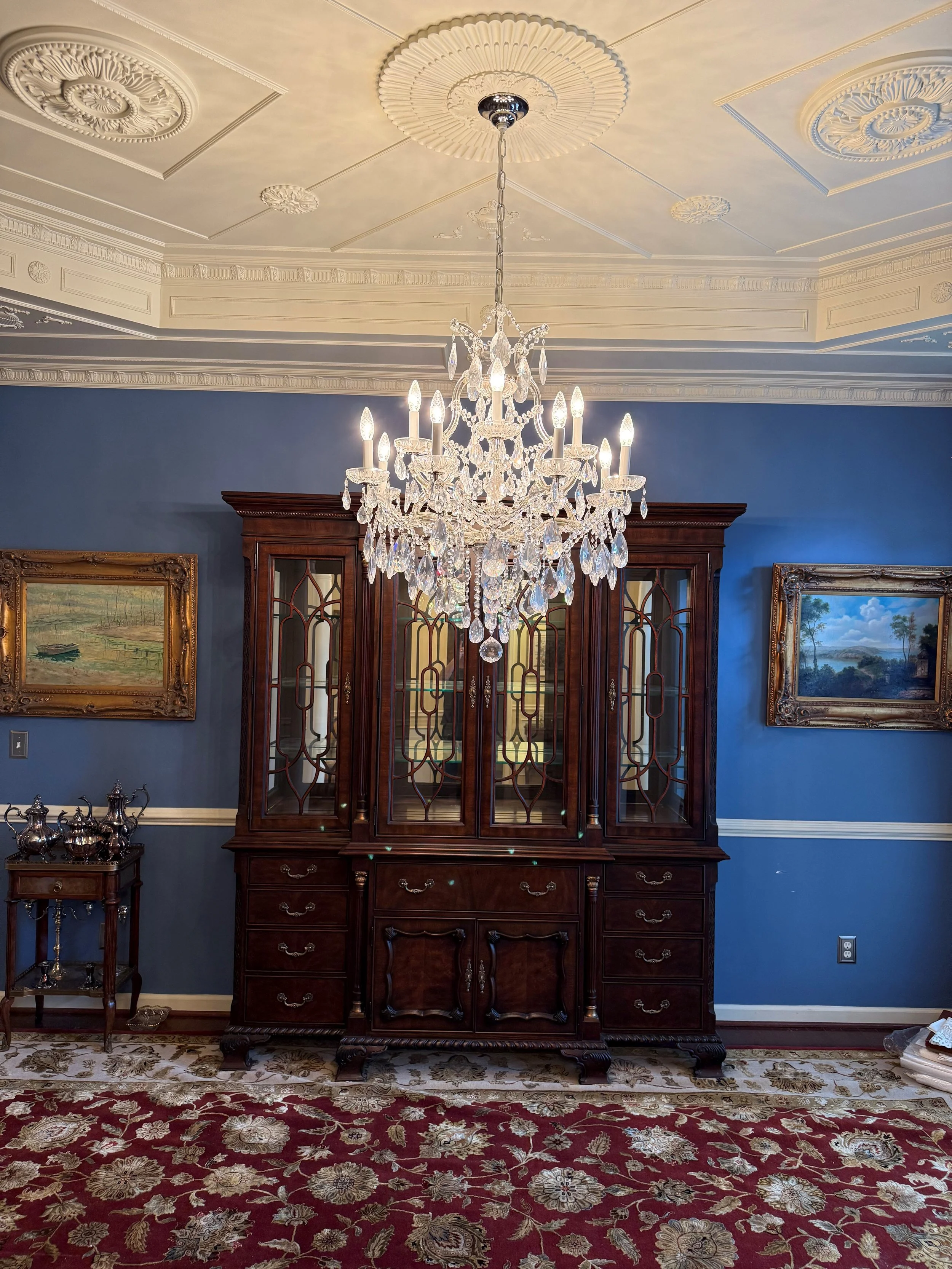 chandelier and breakfront.jpg