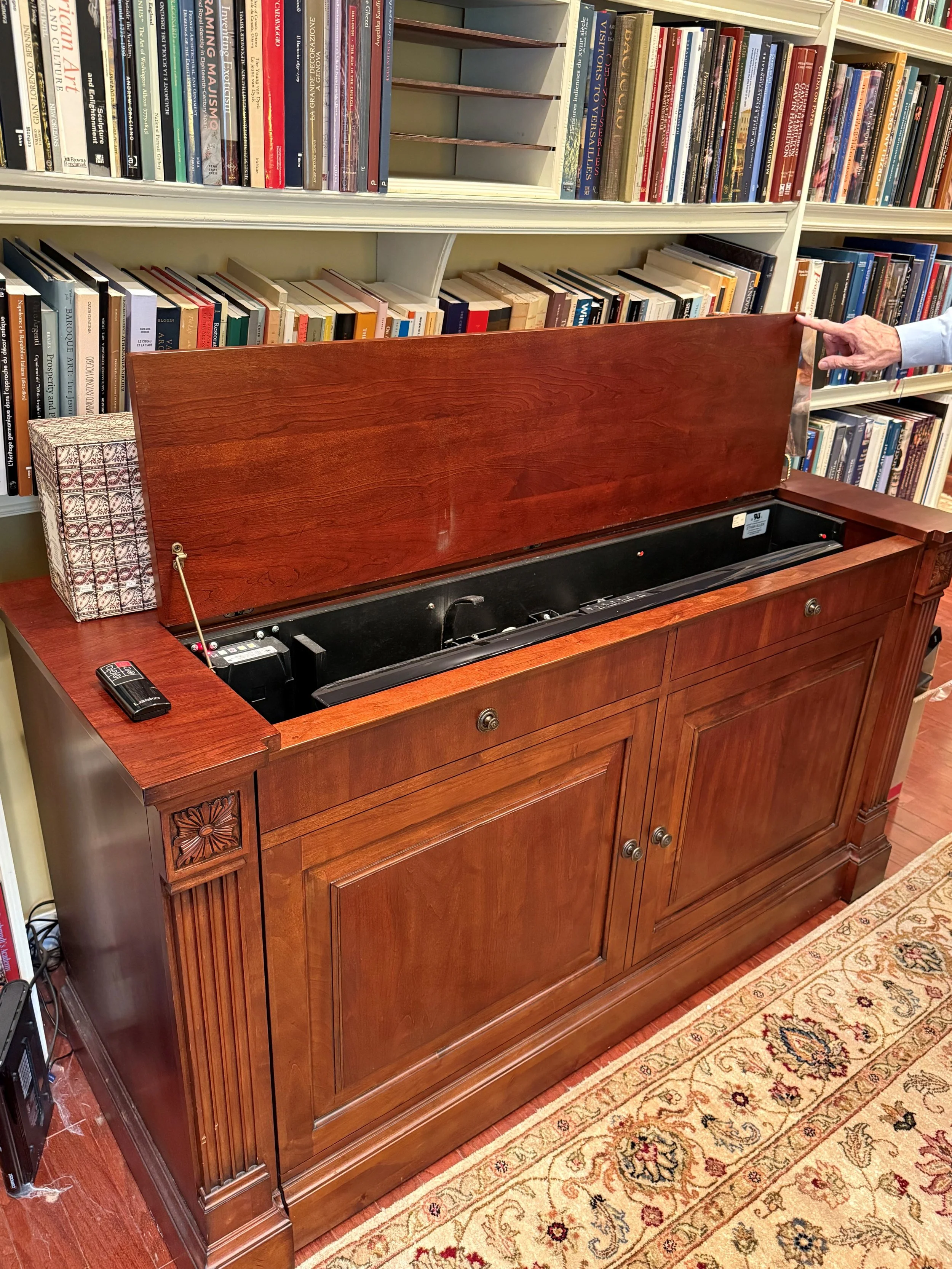 Open cabinet and books.jpg