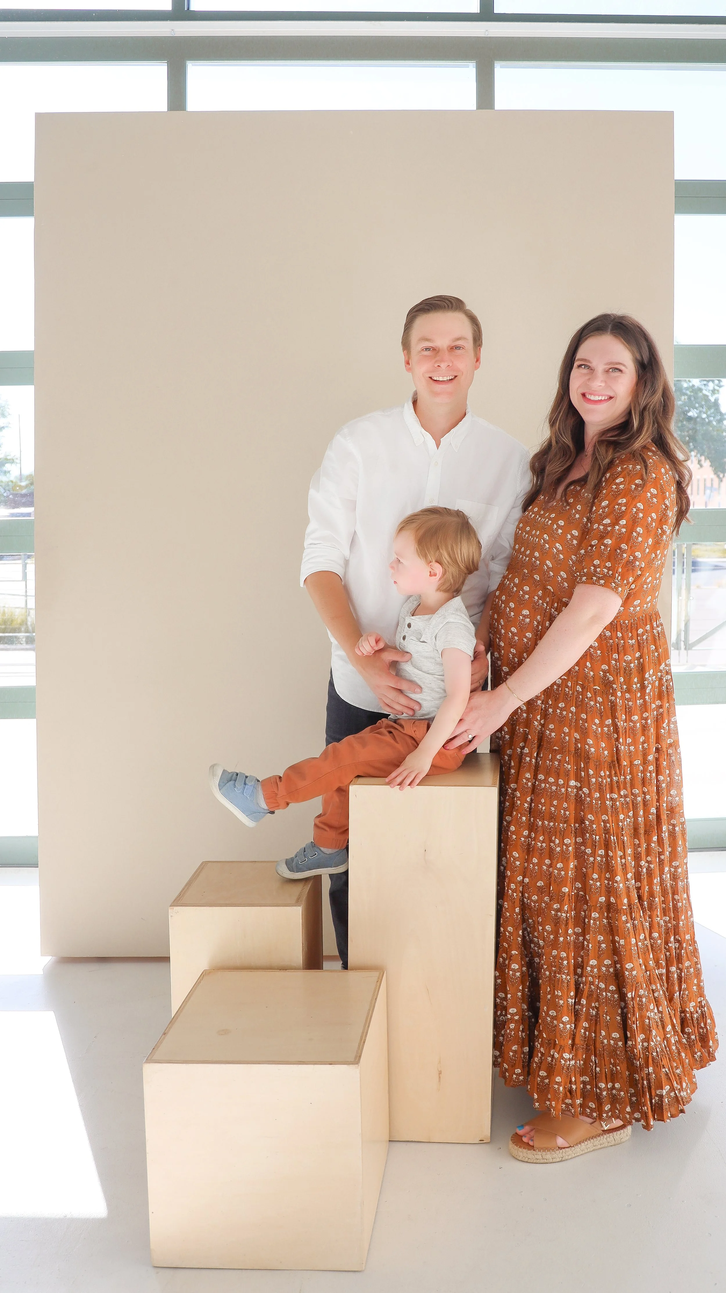 Youngblade family, captured in beautiful maternity photos, eagerly expanding to four. Precious moments in family and maternity photography."