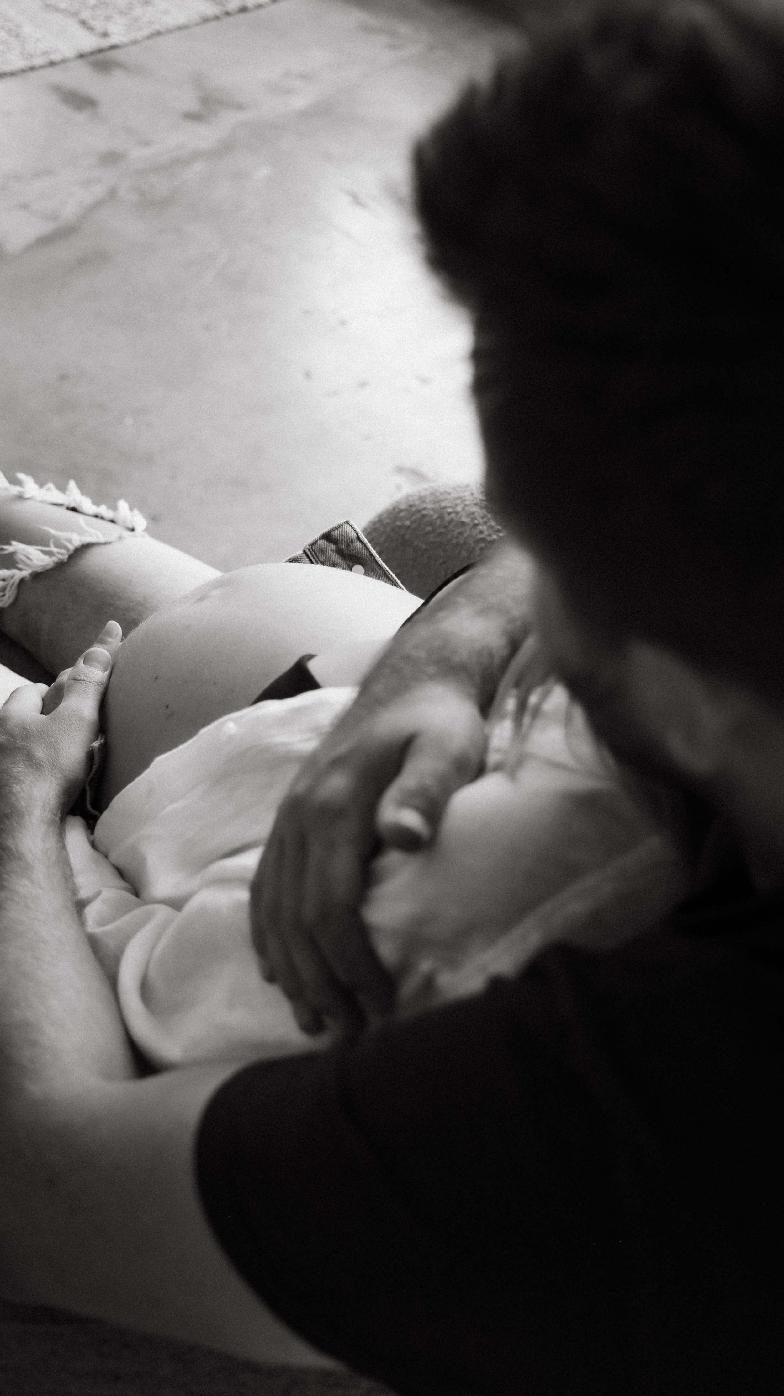 Celebrate the Middleton's journey into parenthood with stunning maternity photography at Realm Studio in Denver, CO, expertly captured by Nicole Schmiedl.