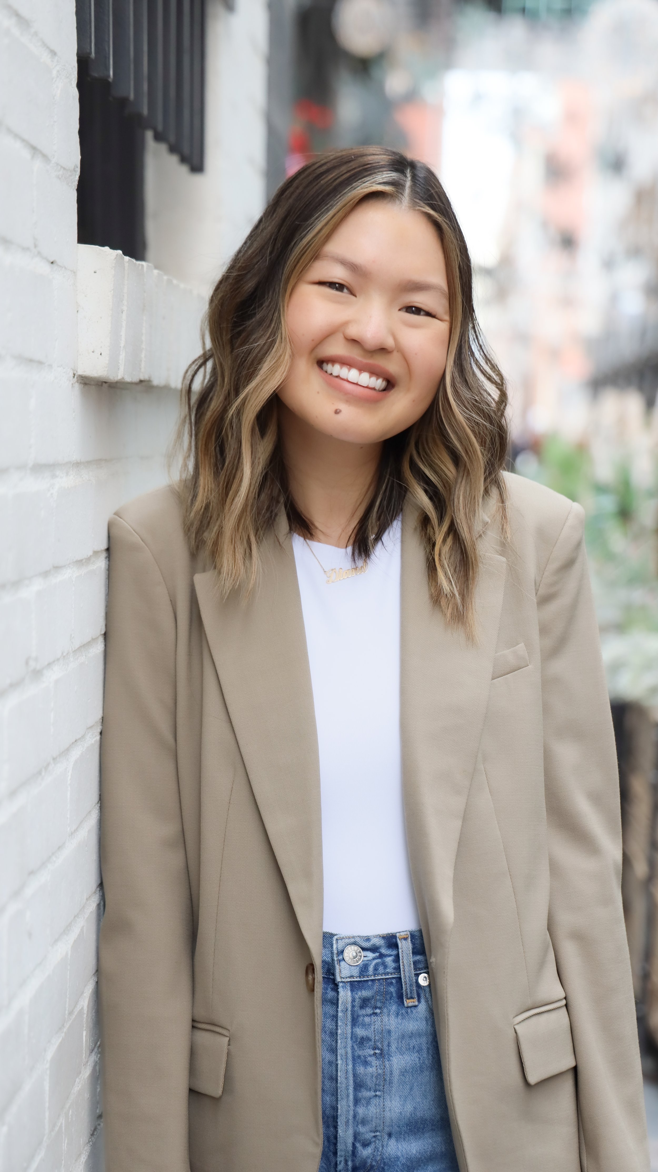 Diana Mai Carlson's professional headshots at Dairy Block, Denver, by Nicole Schmiedl