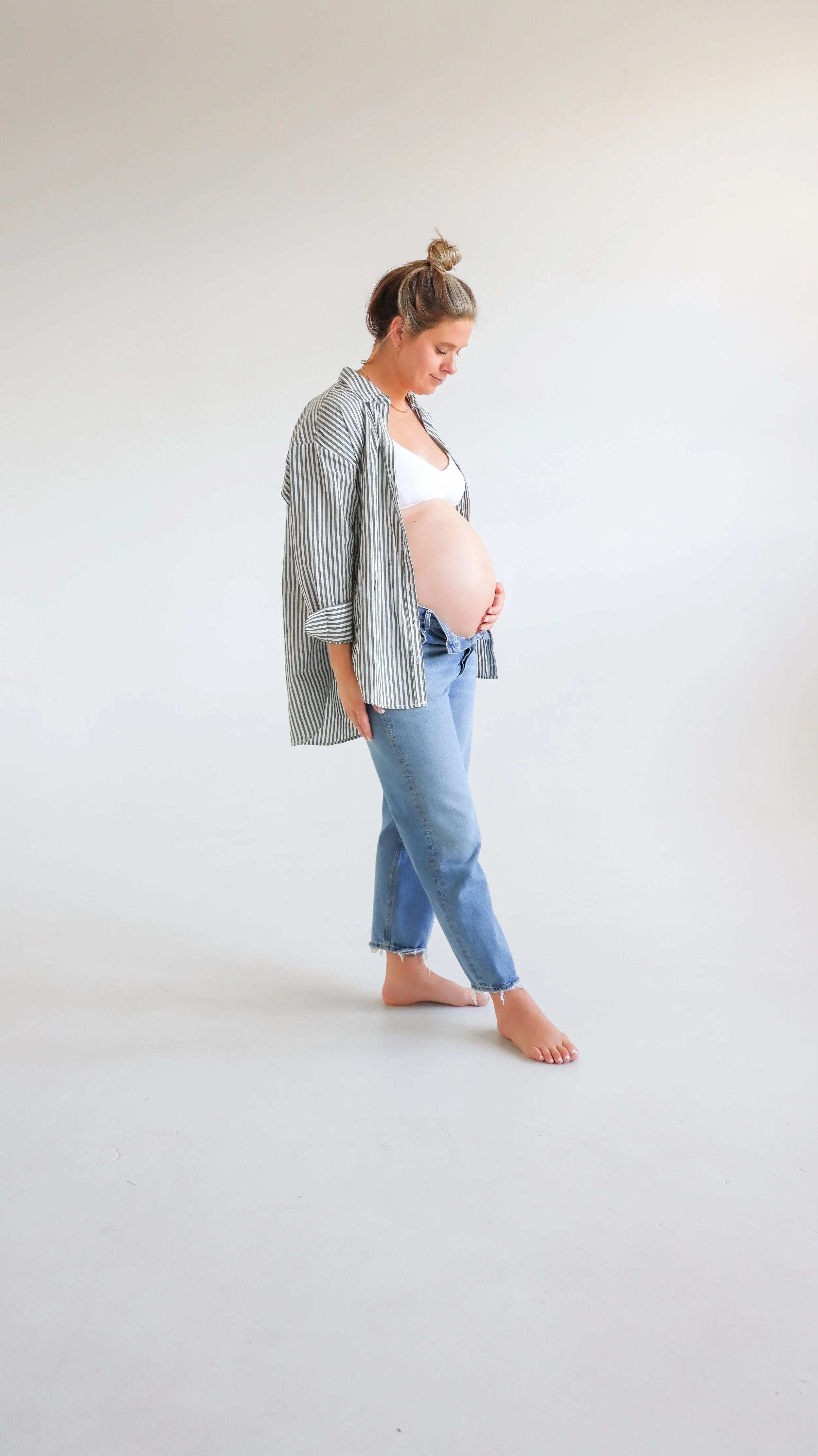 Dove Maternity Photography Session by Nicole Schmiedl at Realm in Denver, CO 