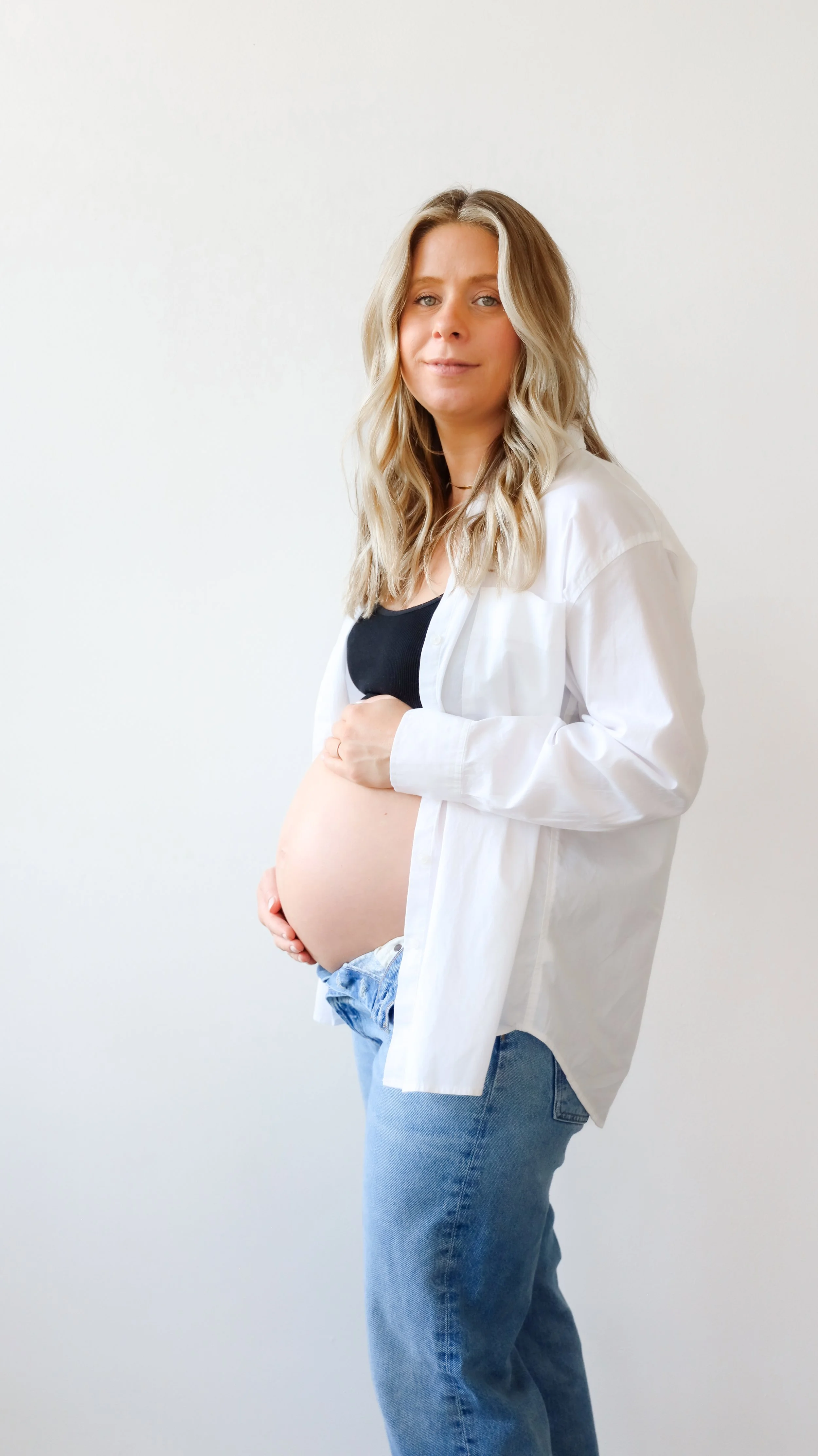 Dove Maternity Photography Session by Nicole Schmiedl at Realm in Denver, CO 