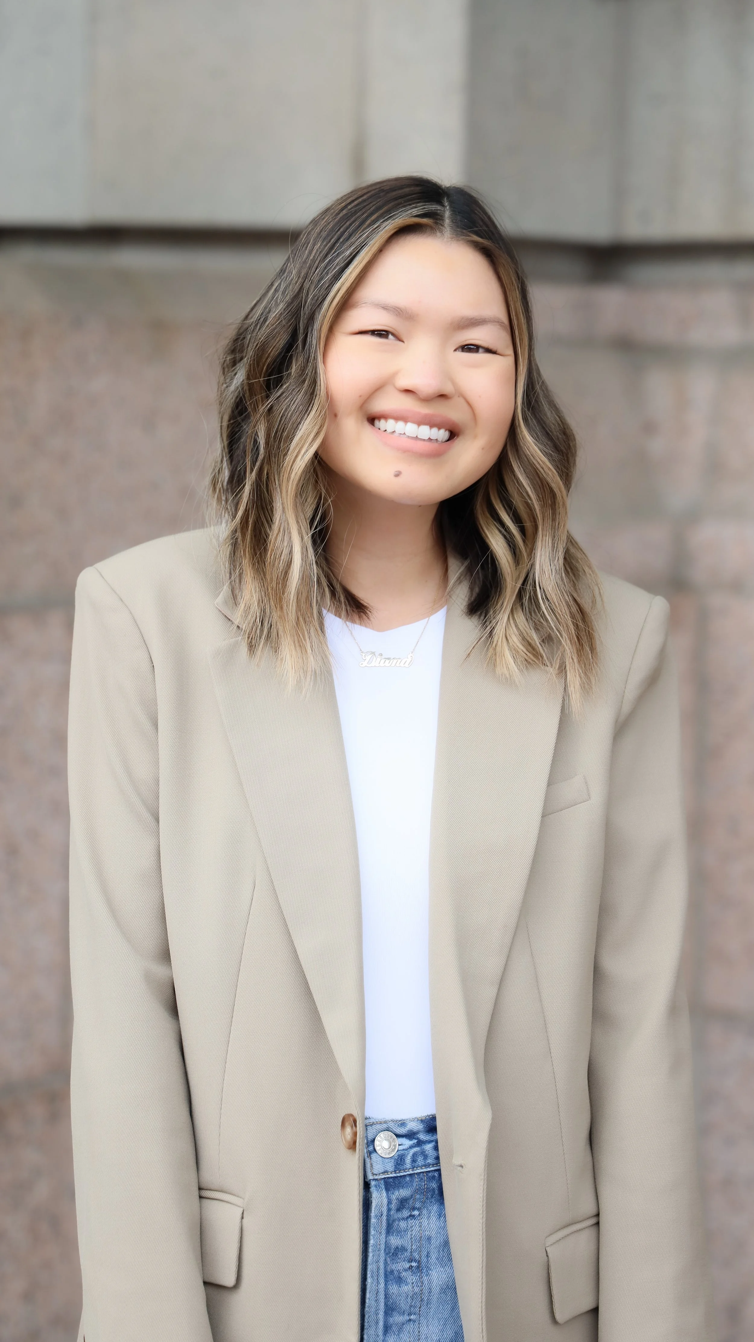 Diana Mai Carlson's professional headshots at Dairy Block, Denver, by Nicole Schmiedl