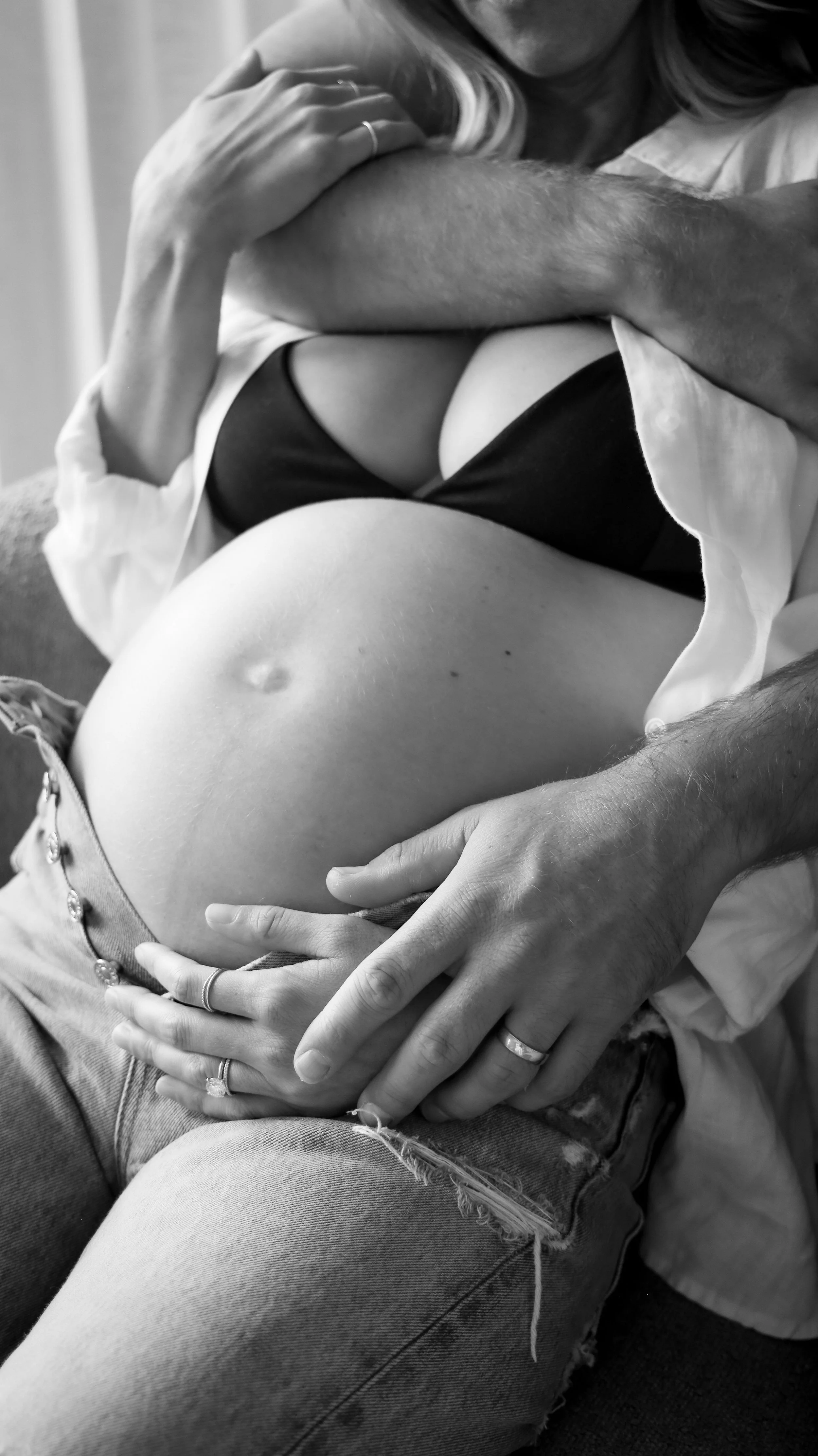 Celebrate the Middleton's journey into parenthood with stunning maternity photography at Realm Studio in Denver, CO, expertly captured by Nicole Schmiedl.