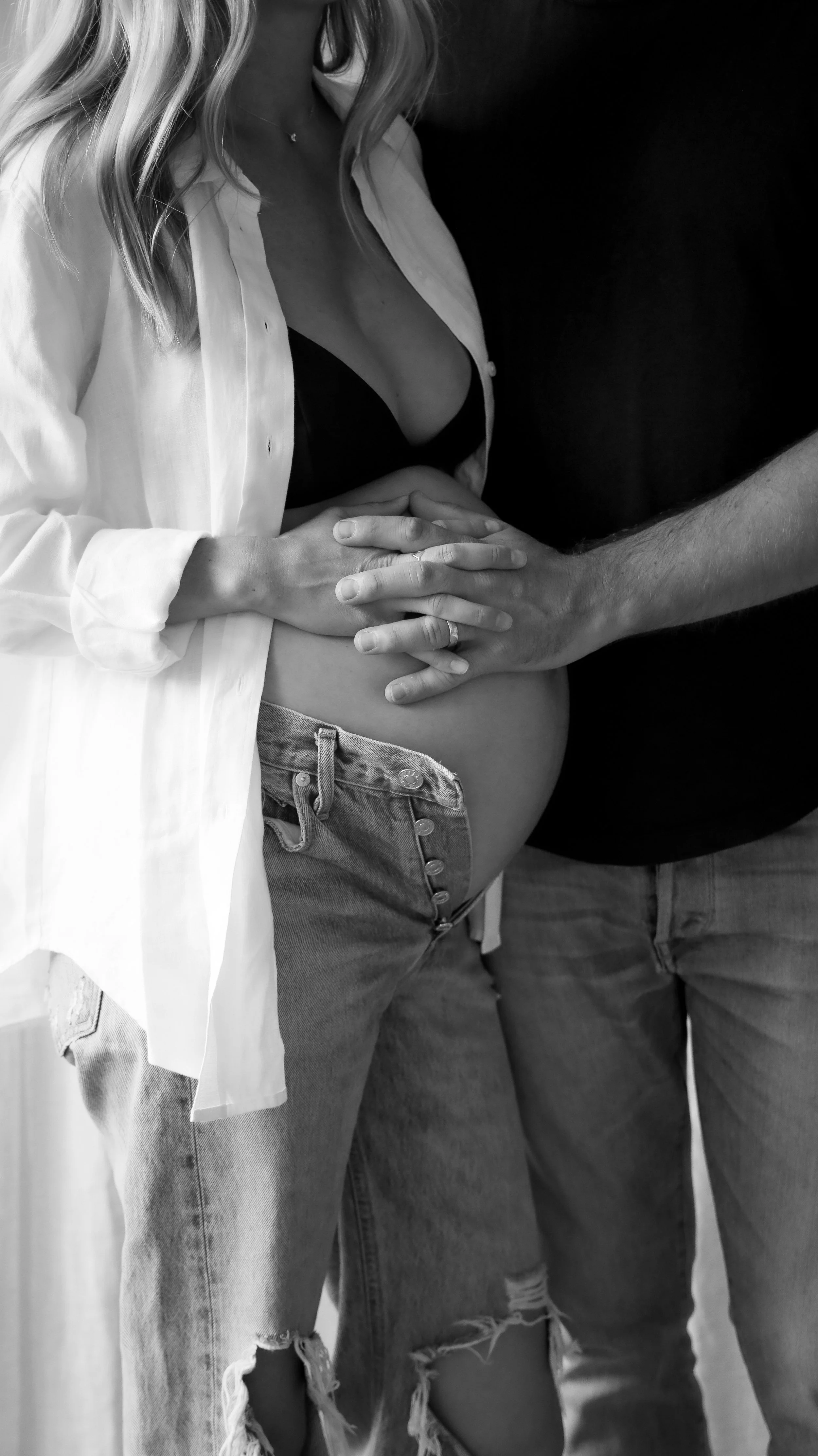 Celebrate the Middleton's journey into parenthood with stunning maternity photography at Realm Studio in Denver, CO, expertly captured by Nicole Schmiedl.