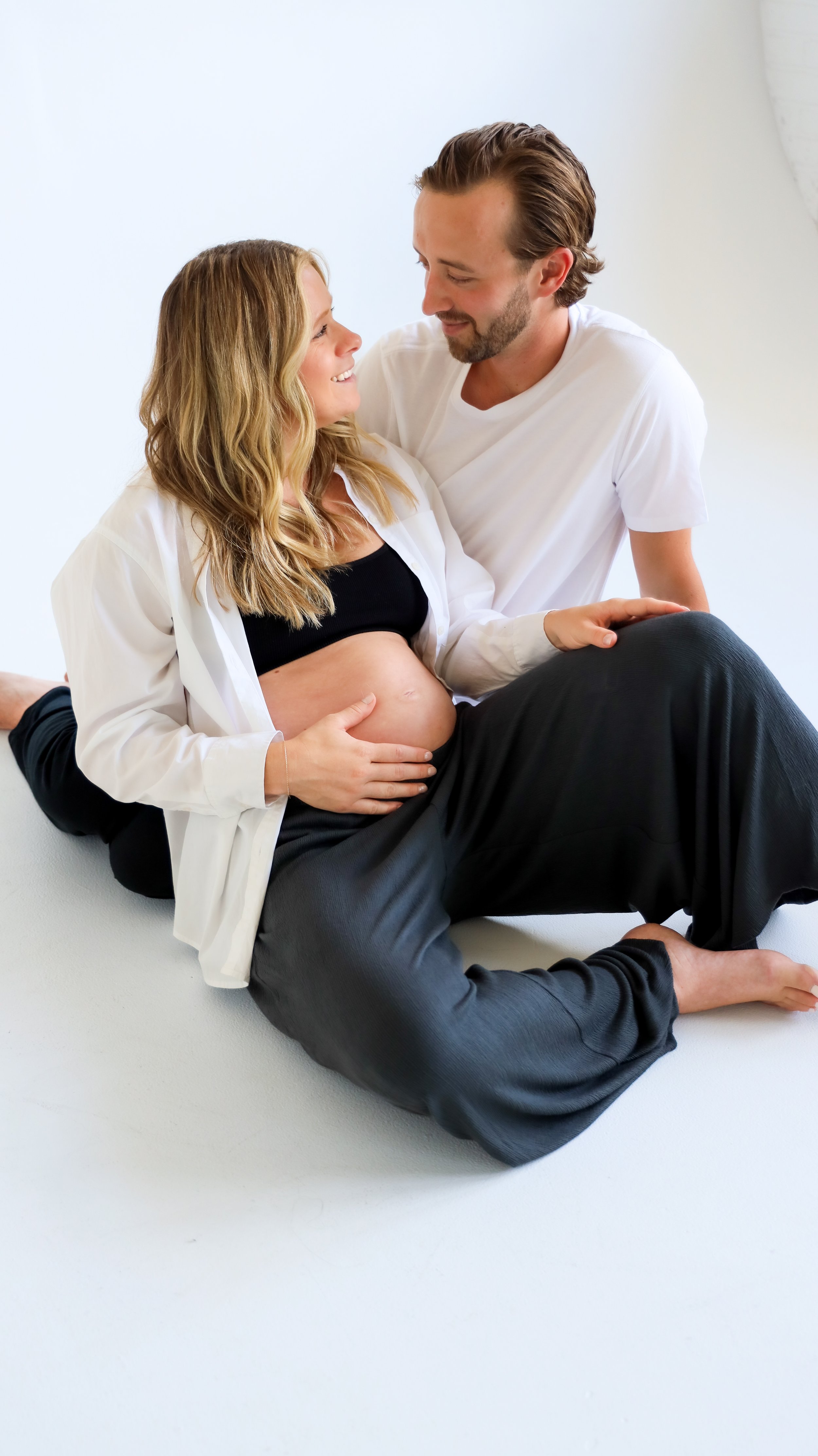 Dove Maternity Photography Session by Nicole Schmiedl at Realm in Denver, CO 