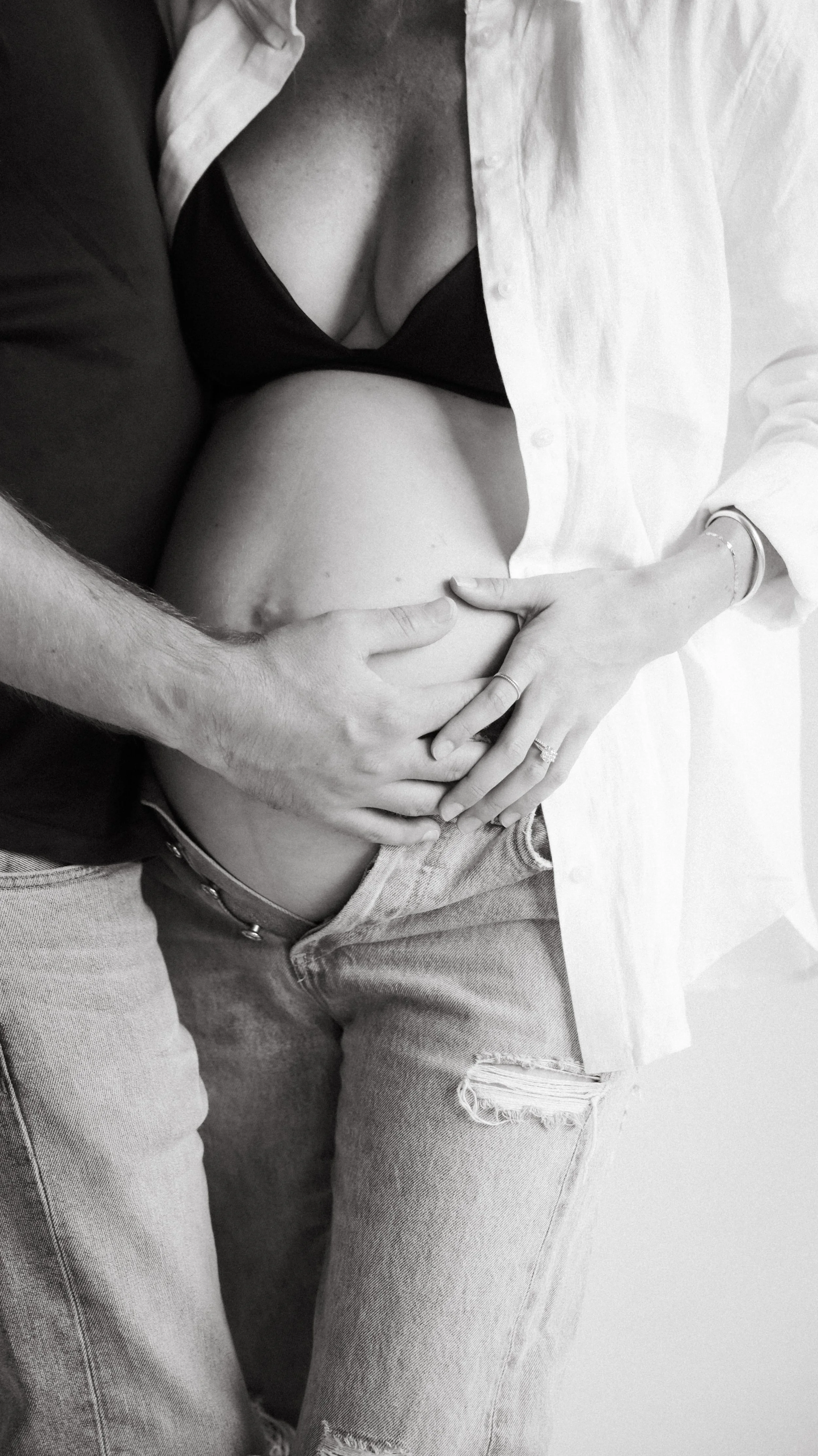 Celebrate the Middleton's journey into parenthood with stunning maternity photography at Realm Studio in Denver, CO, expertly captured by Nicole Schmiedl.
