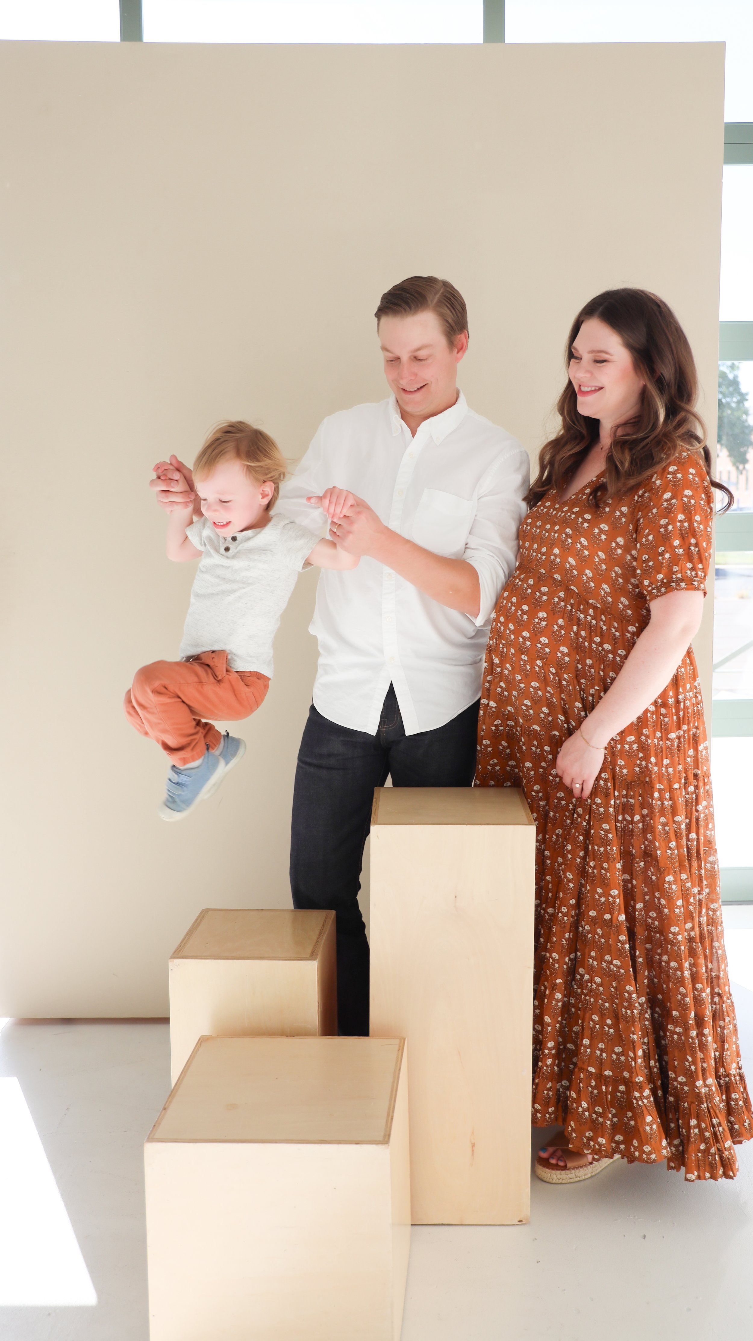 Youngblade family, captured in beautiful maternity photos, eagerly expanding to four. Precious moments in family and maternity photography."
