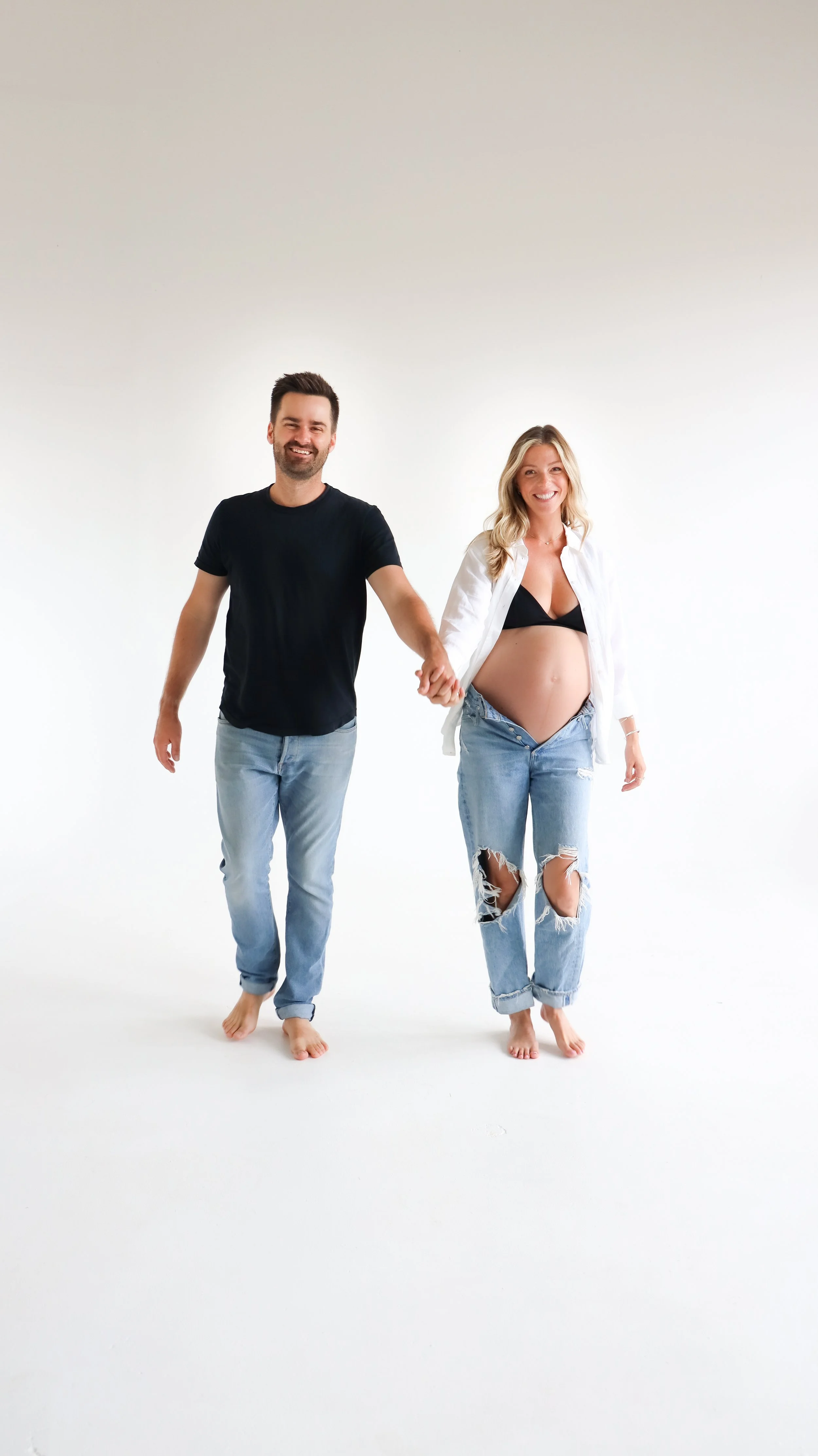 Celebrate the Middleton's journey into parenthood with stunning maternity photography at Realm Studio in Denver, CO, expertly captured by Nicole Schmiedl.