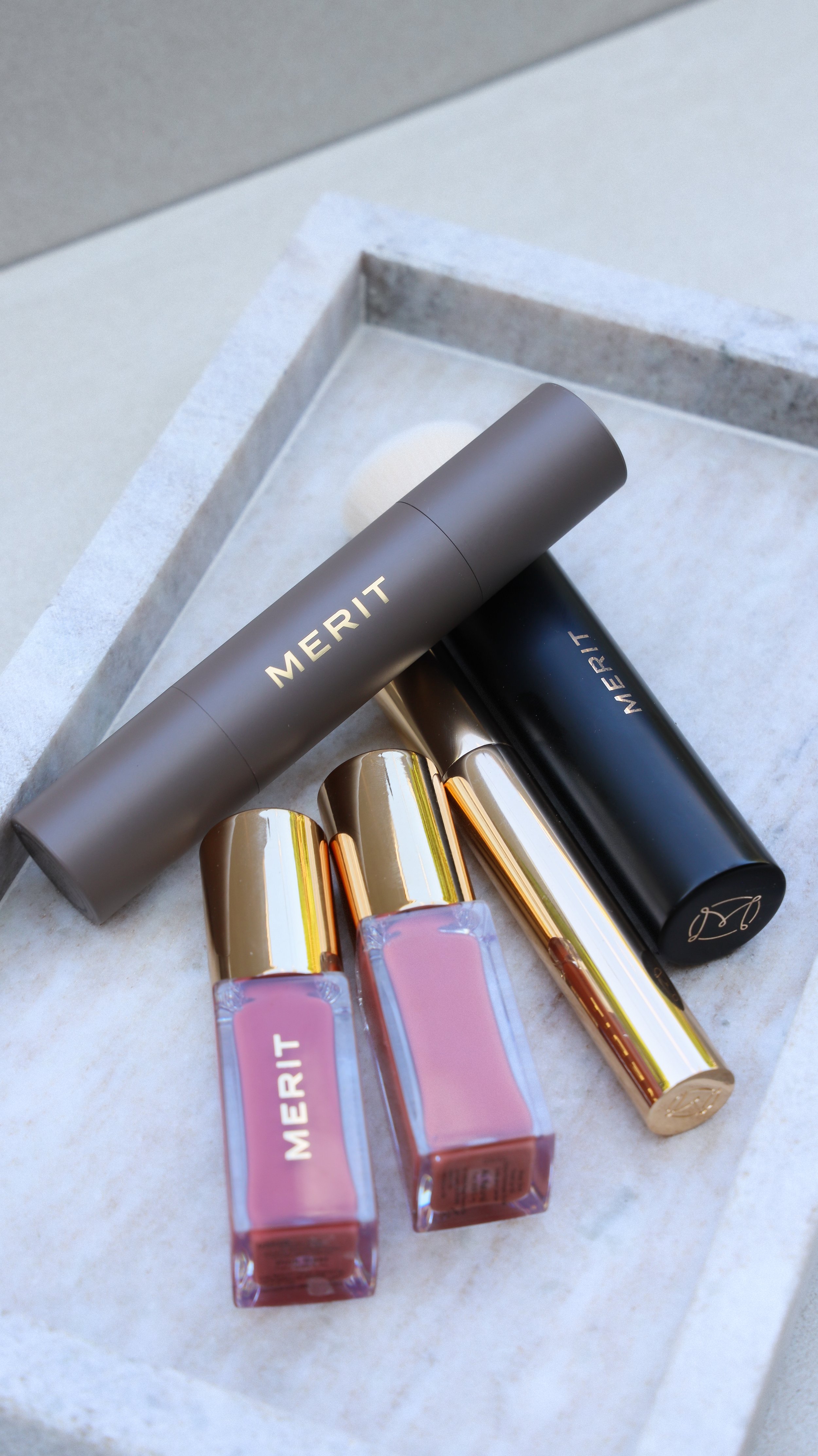 Merit Beauty lip stain, brow gel, concealer and blending brush by Nicole Schmiedl