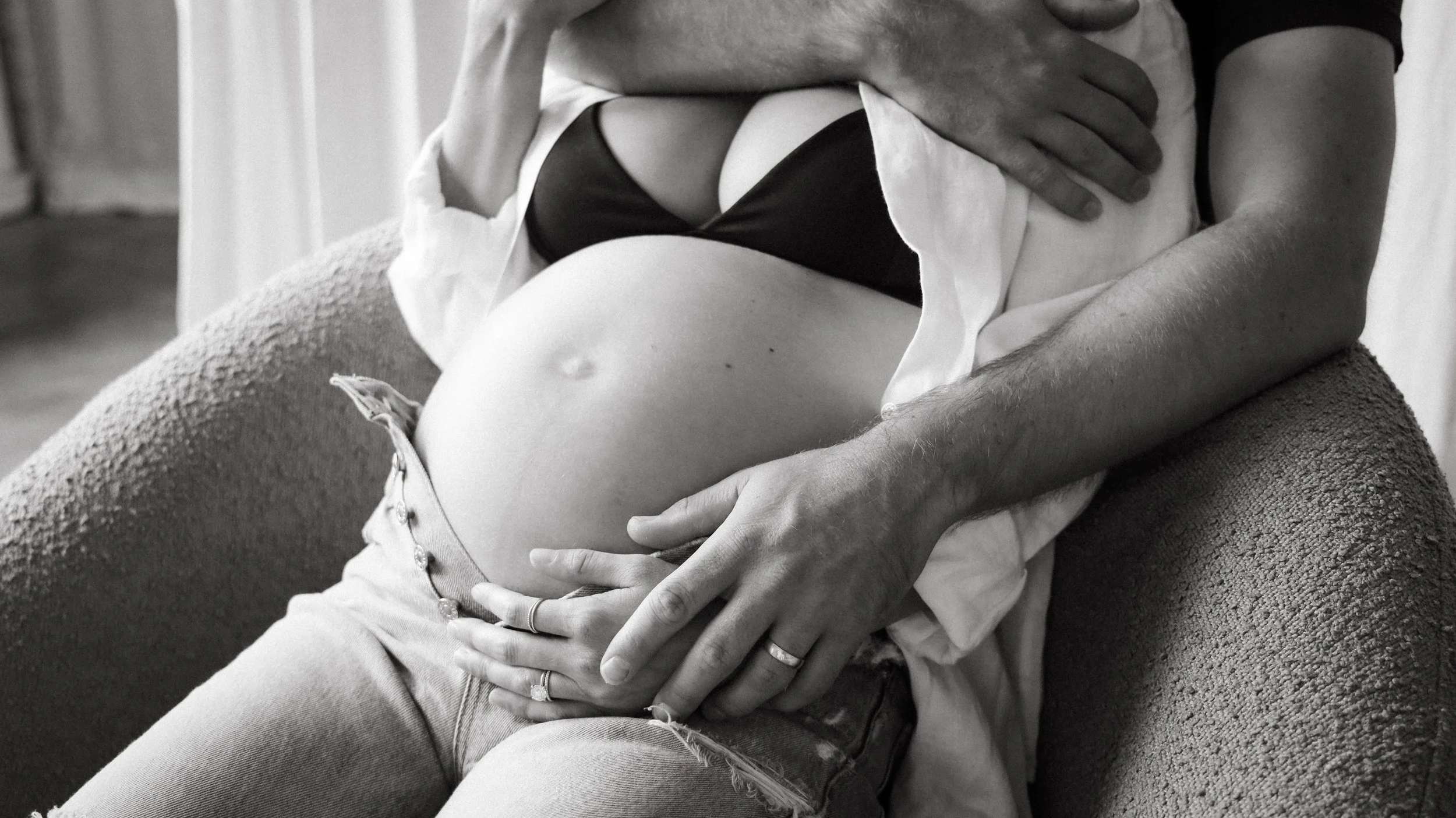 Celebrate the Middleton's journey into parenthood with stunning maternity photography at Realm Studio in Denver, CO, expertly captured by Nicole Schmiedl.