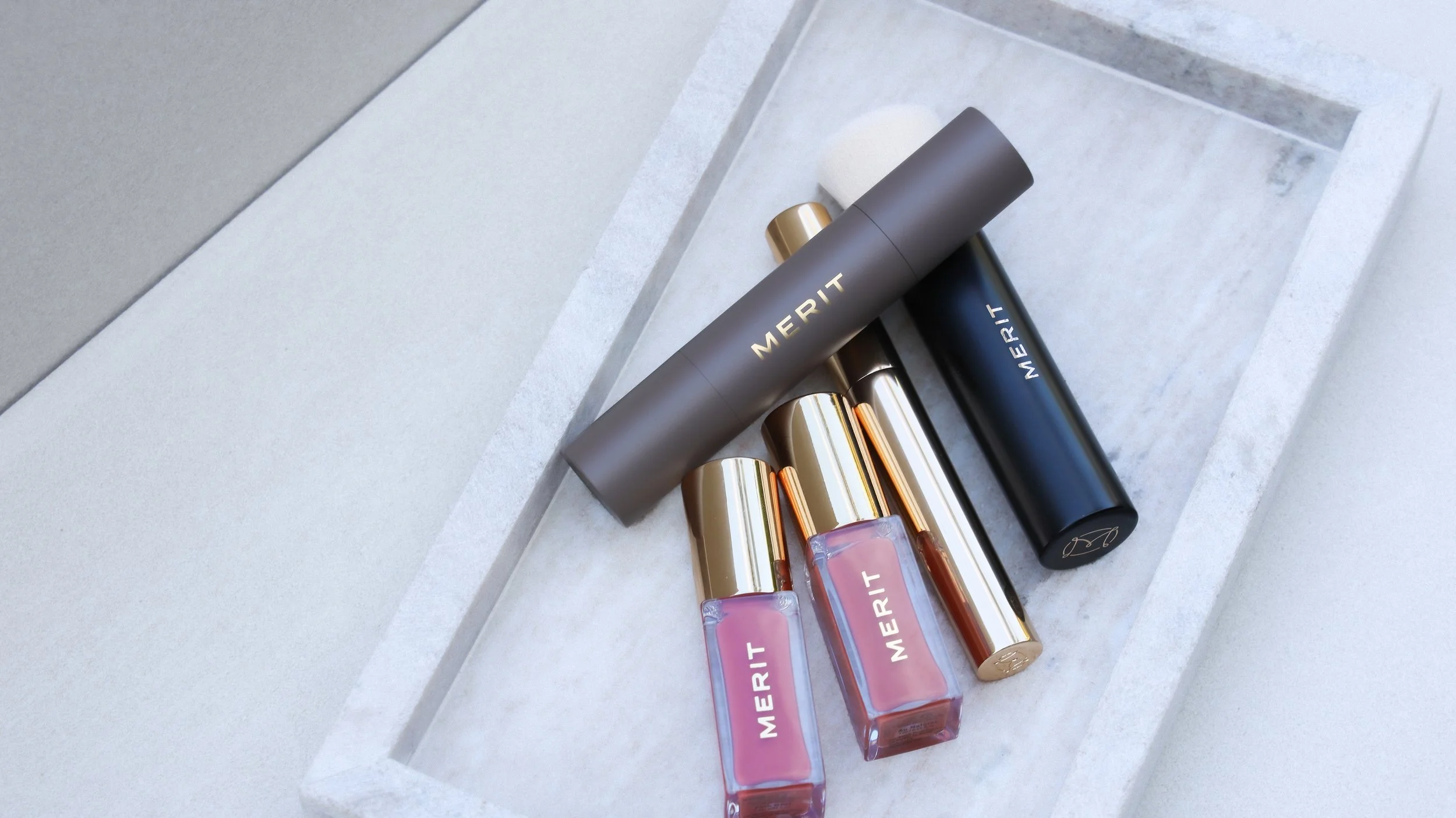 Merit Beauty lip stain, brow gel, concealer and blending brush by Nicole Schmiedl