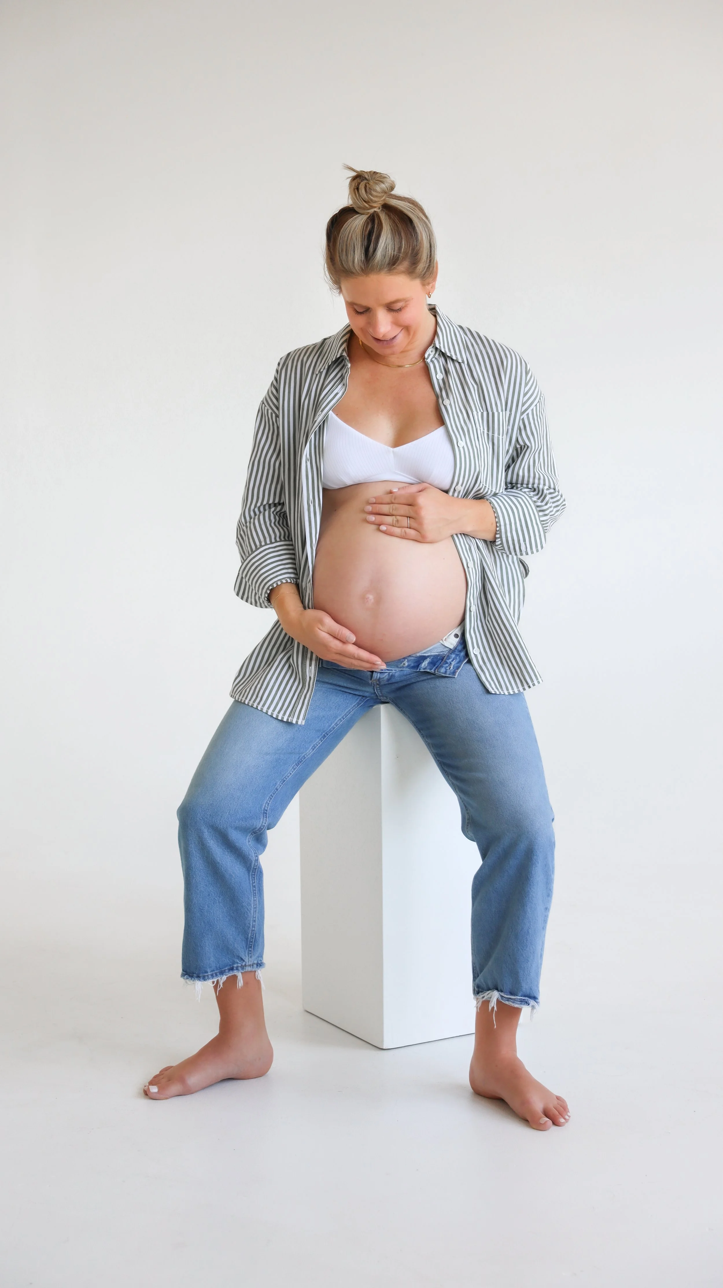 Dove Maternity Photography Session by Nicole Schmiedl at Realm in Denver, CO 