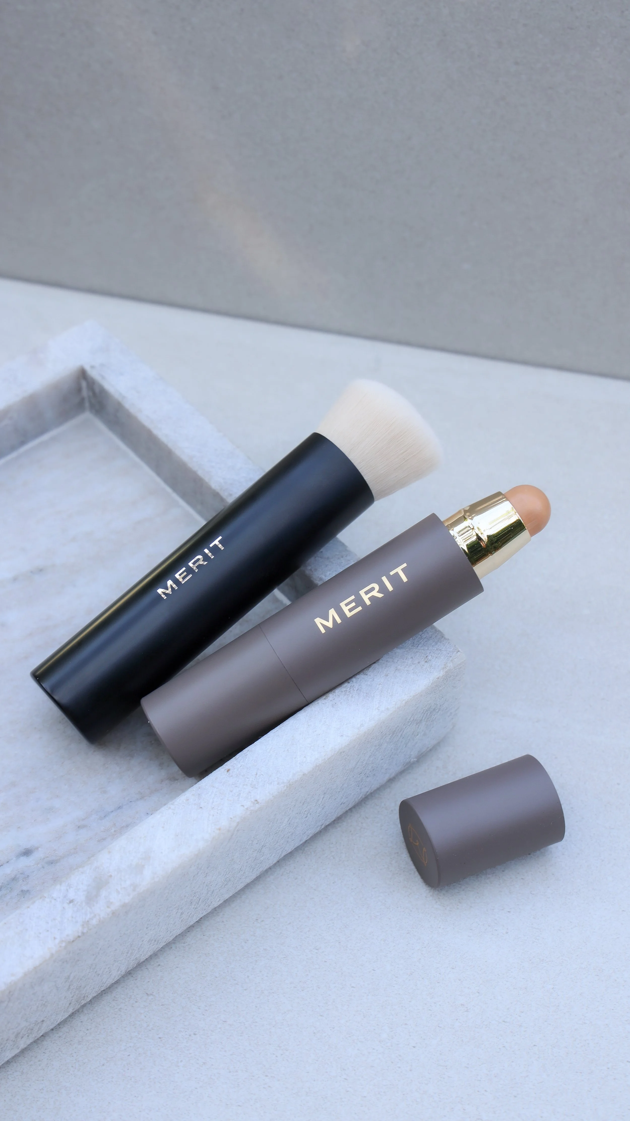 Merit Beauty concealer and blending brush by Nicole Schmiedl